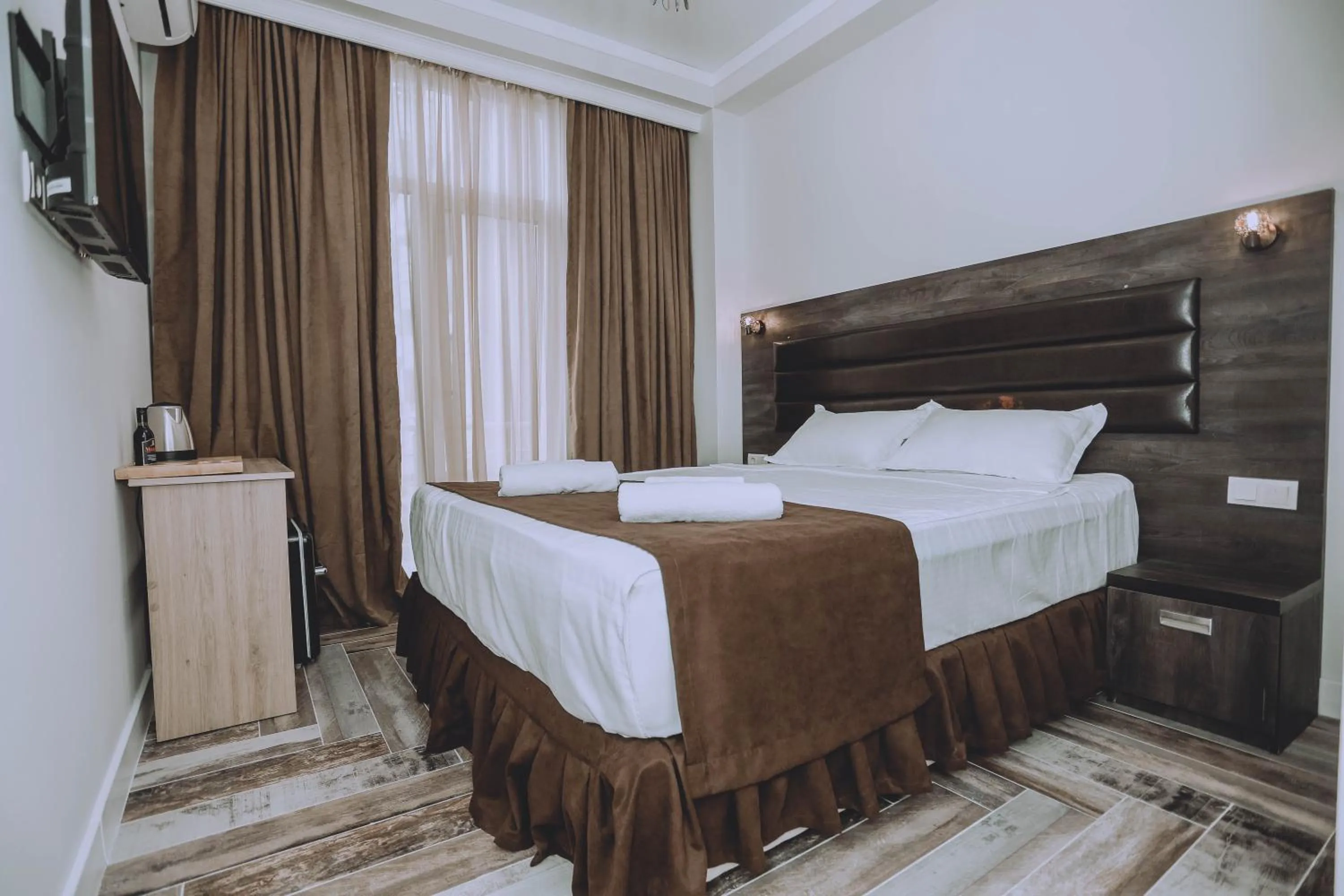Bed in Royal Medis Hotel