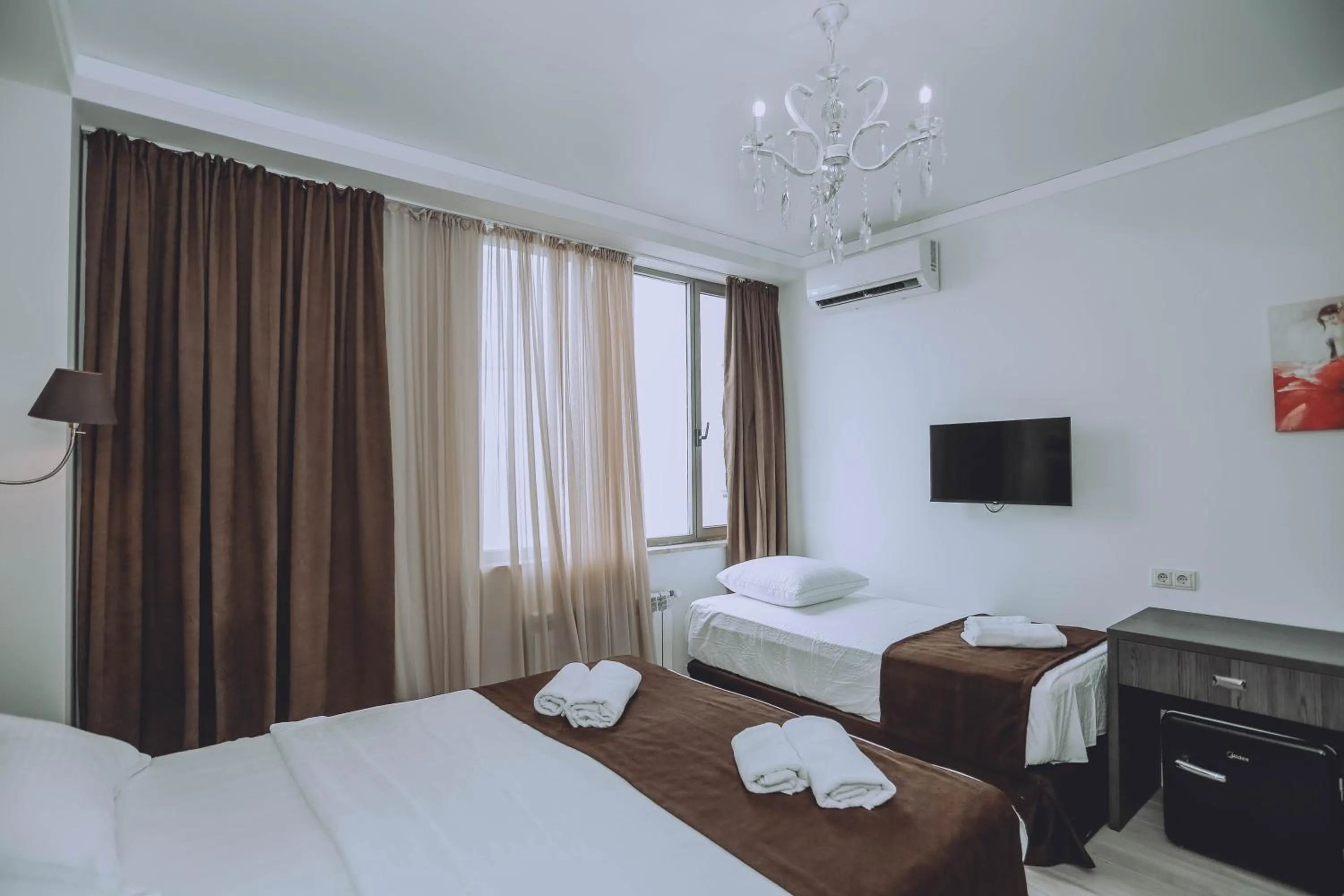 Bed in Royal Medis Hotel