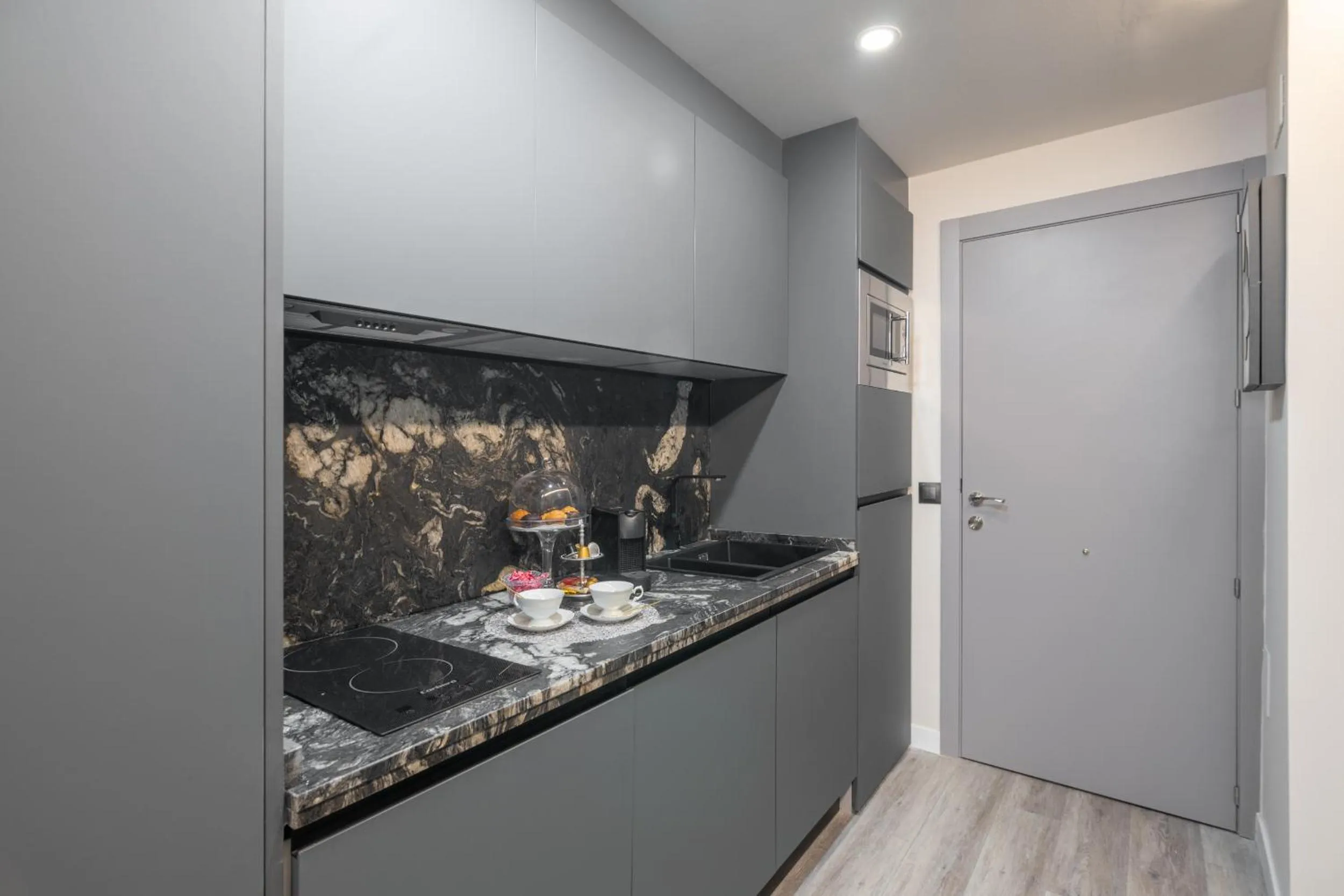 Kitchen or kitchenette in Palacete de Álamos Apartamentos