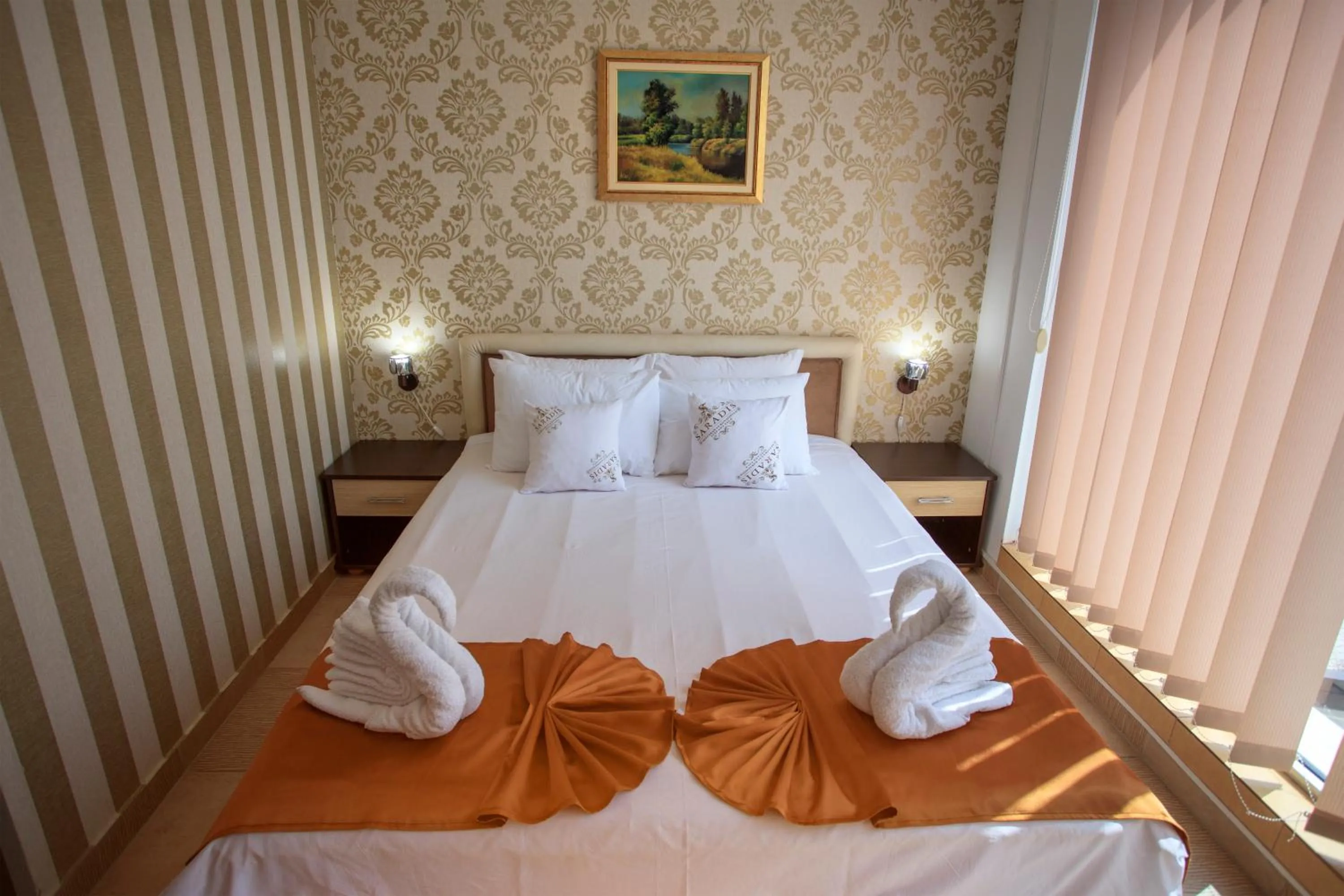 Bed in Hotel Saradis