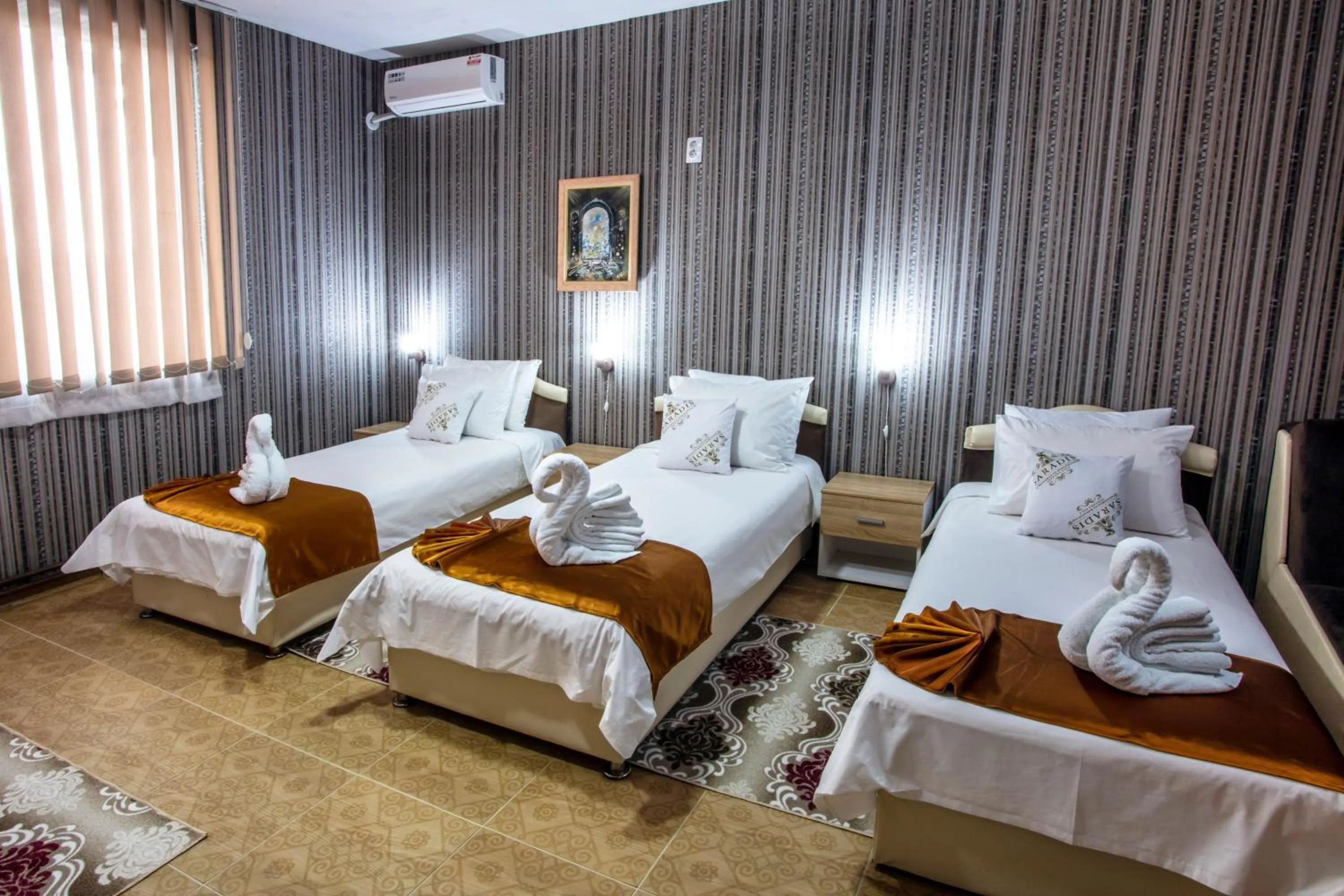 Bed in Hotel Saradis
