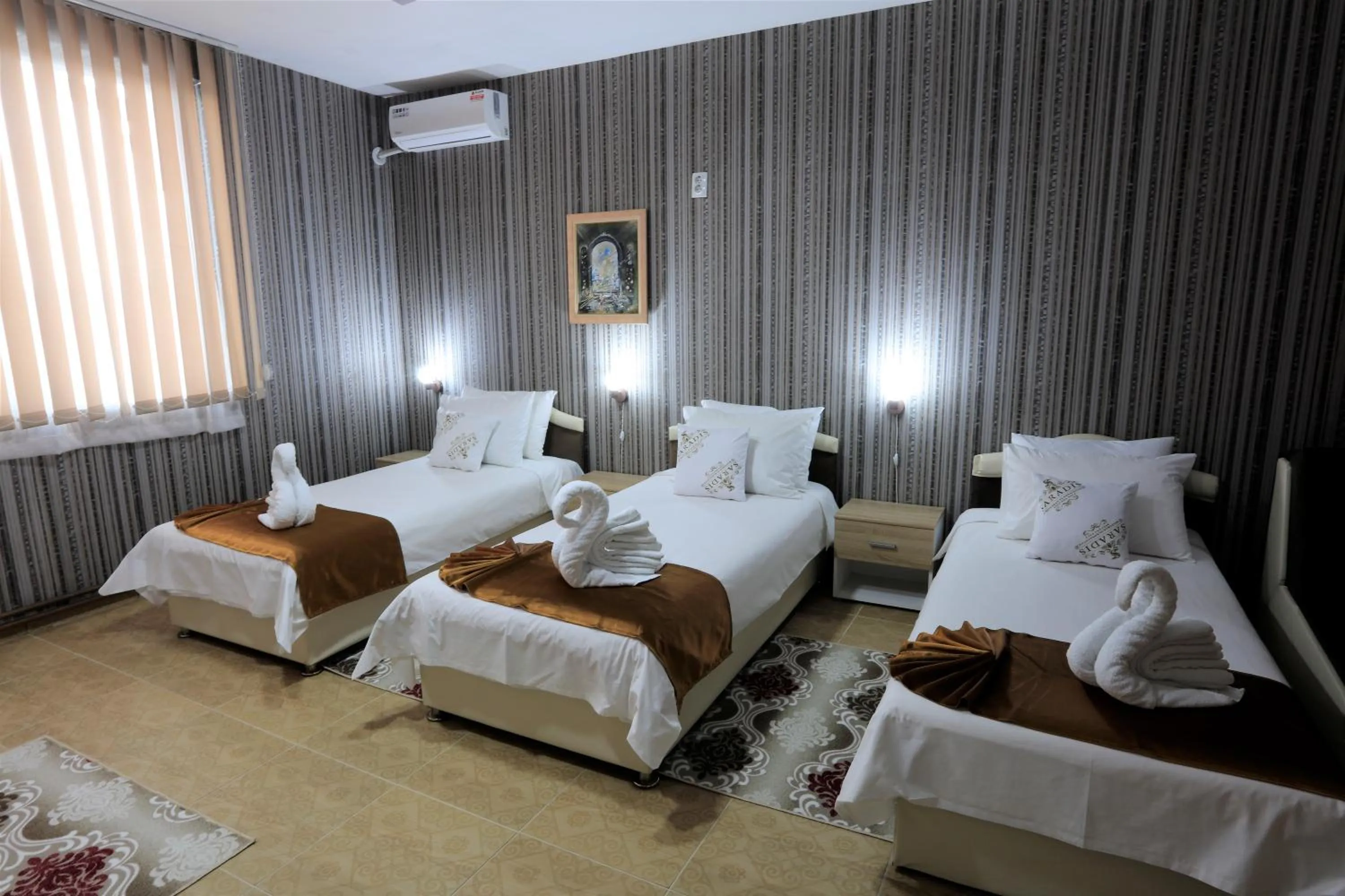 Bed in Hotel Saradis