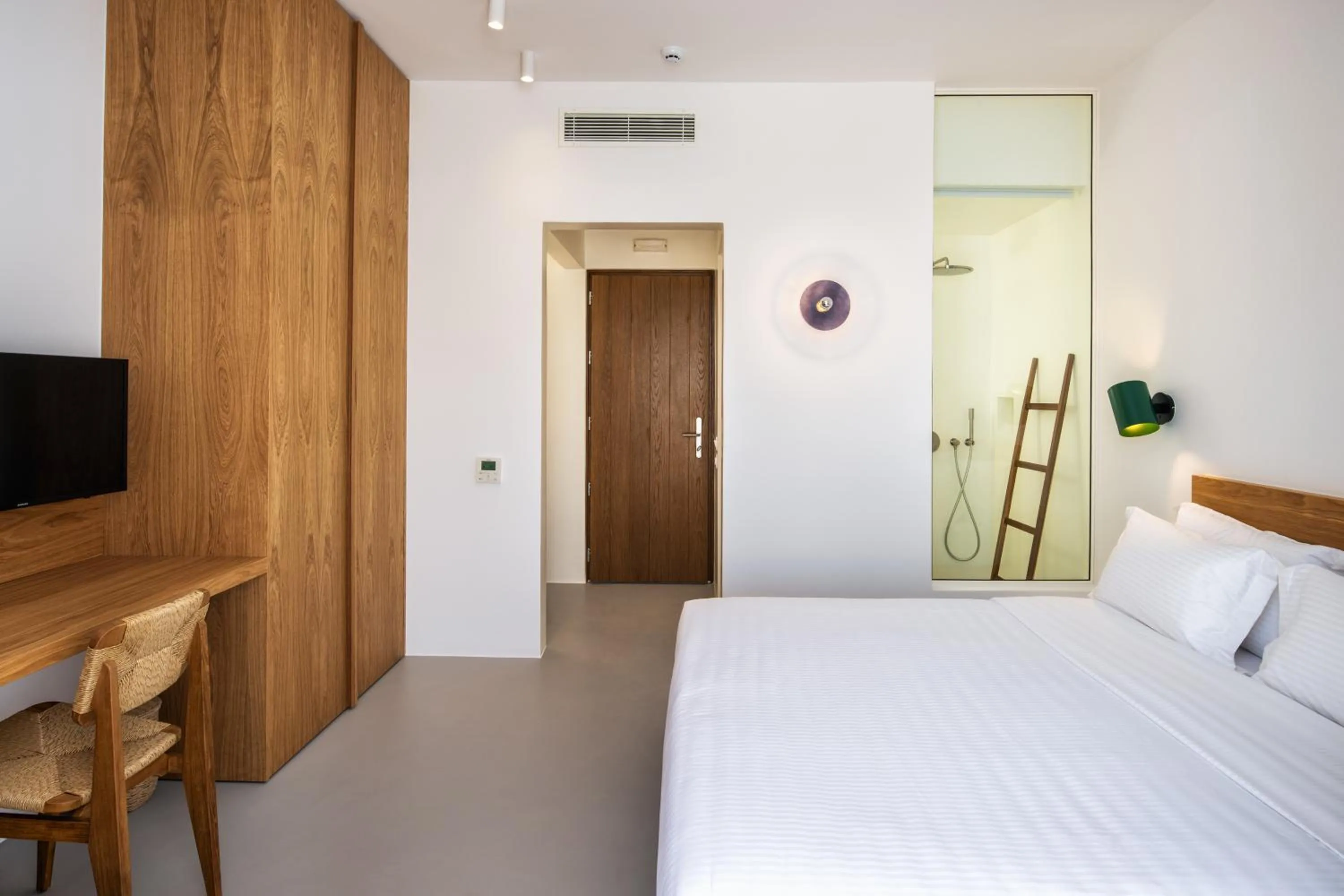 Bed in Viva Nove Suites