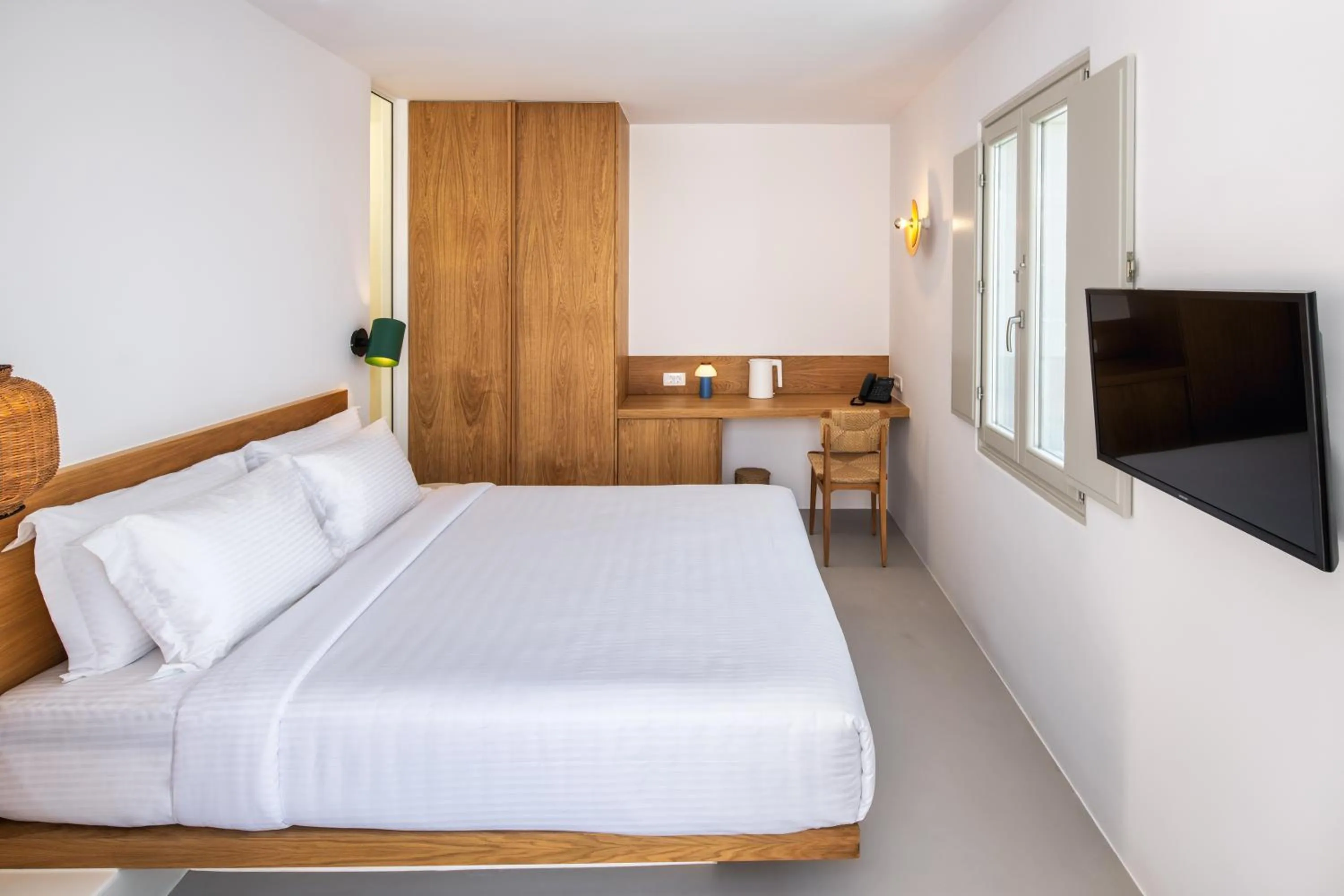 Bed in Viva Nove Suites