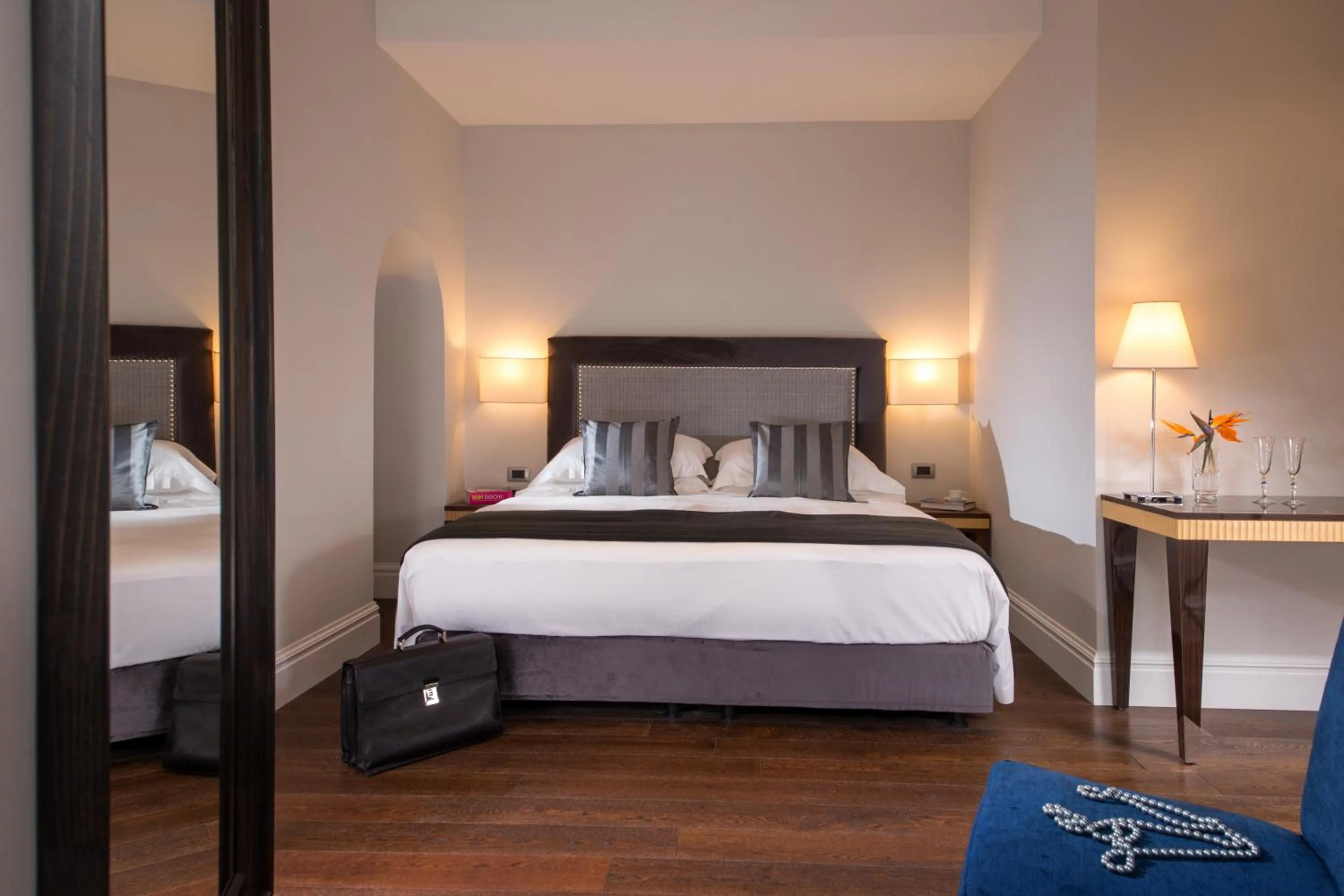 Bed in Tridente Suites