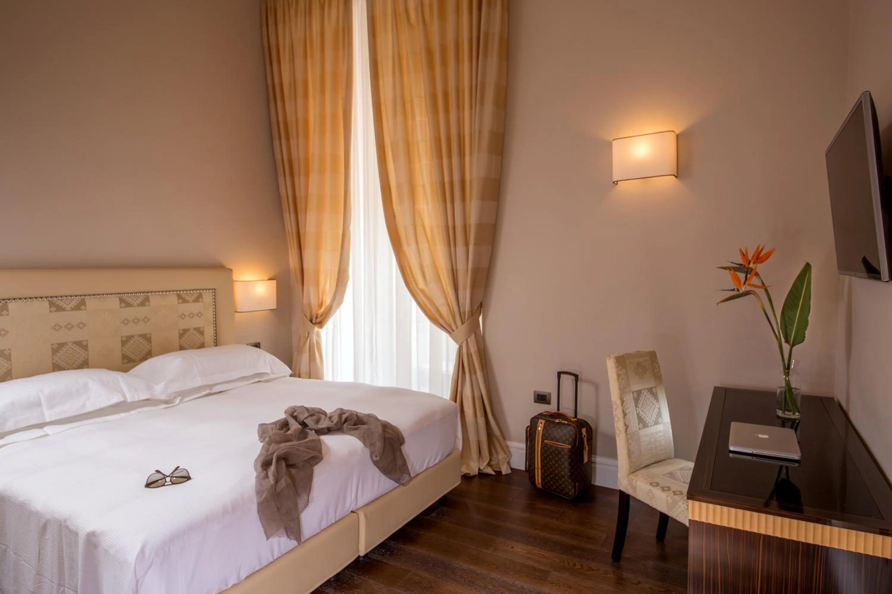 Bed in Tridente Suites