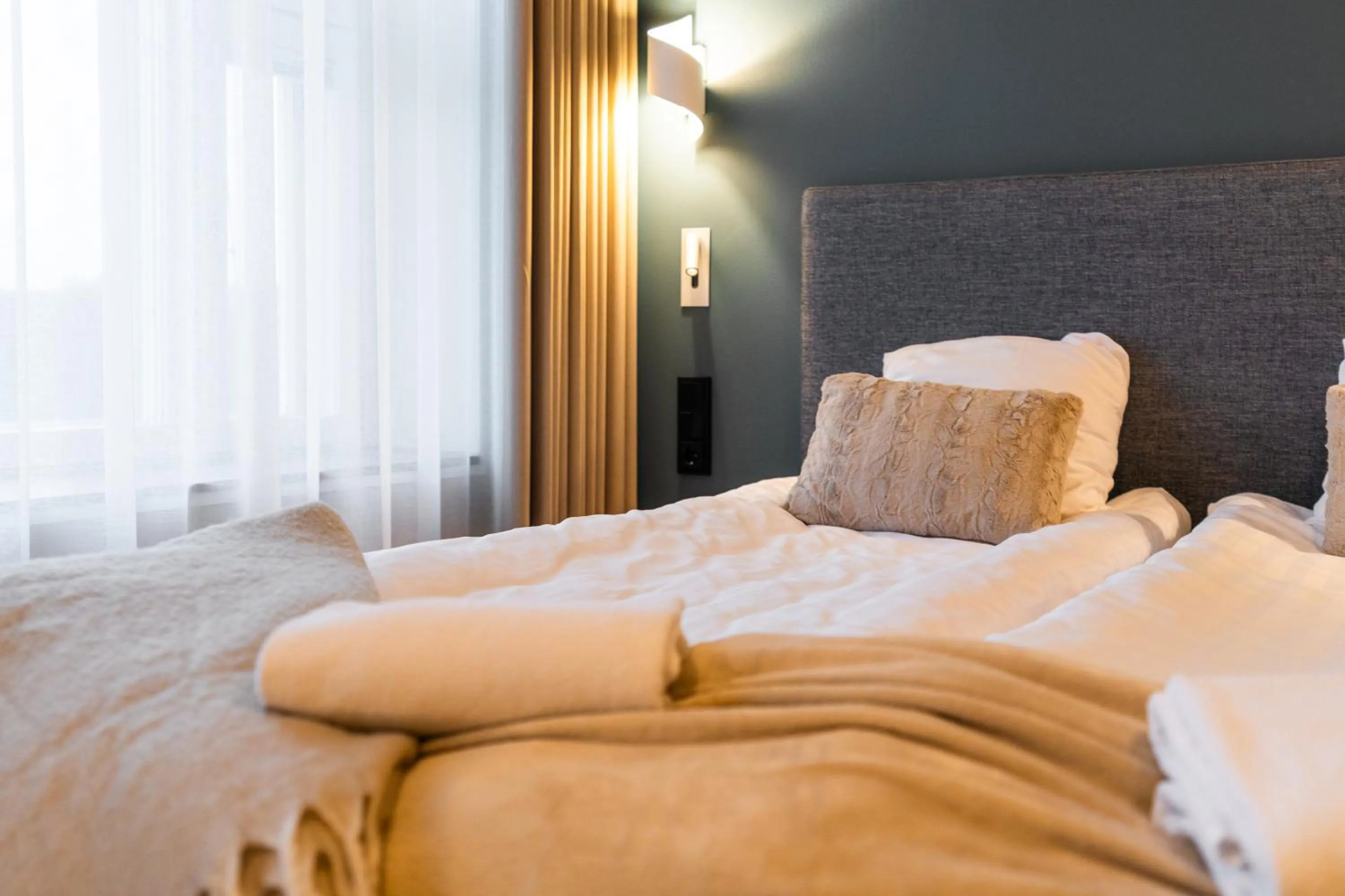 Bed in Postmaster Hotel