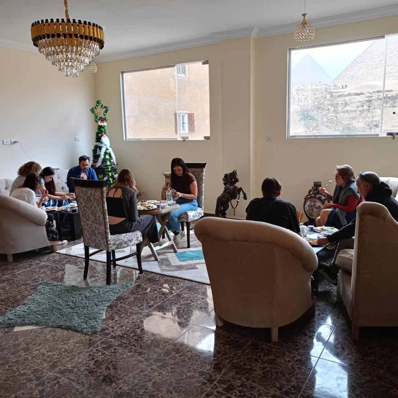Family in El Khalil Pyramids View Inn