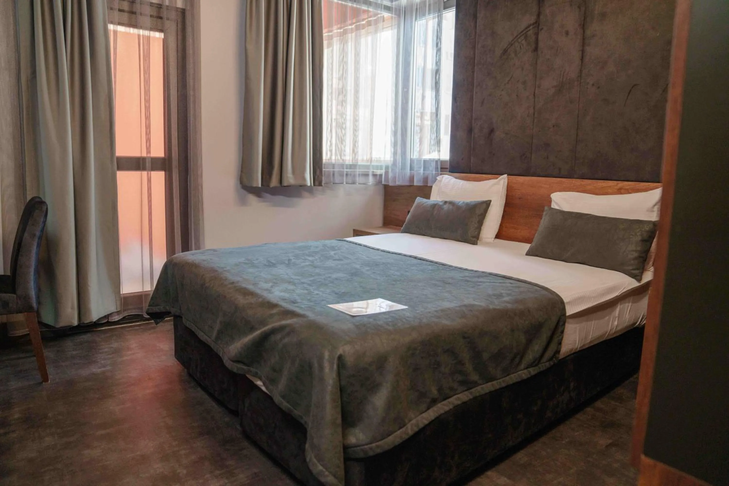 Bed in SennaCity Hotel