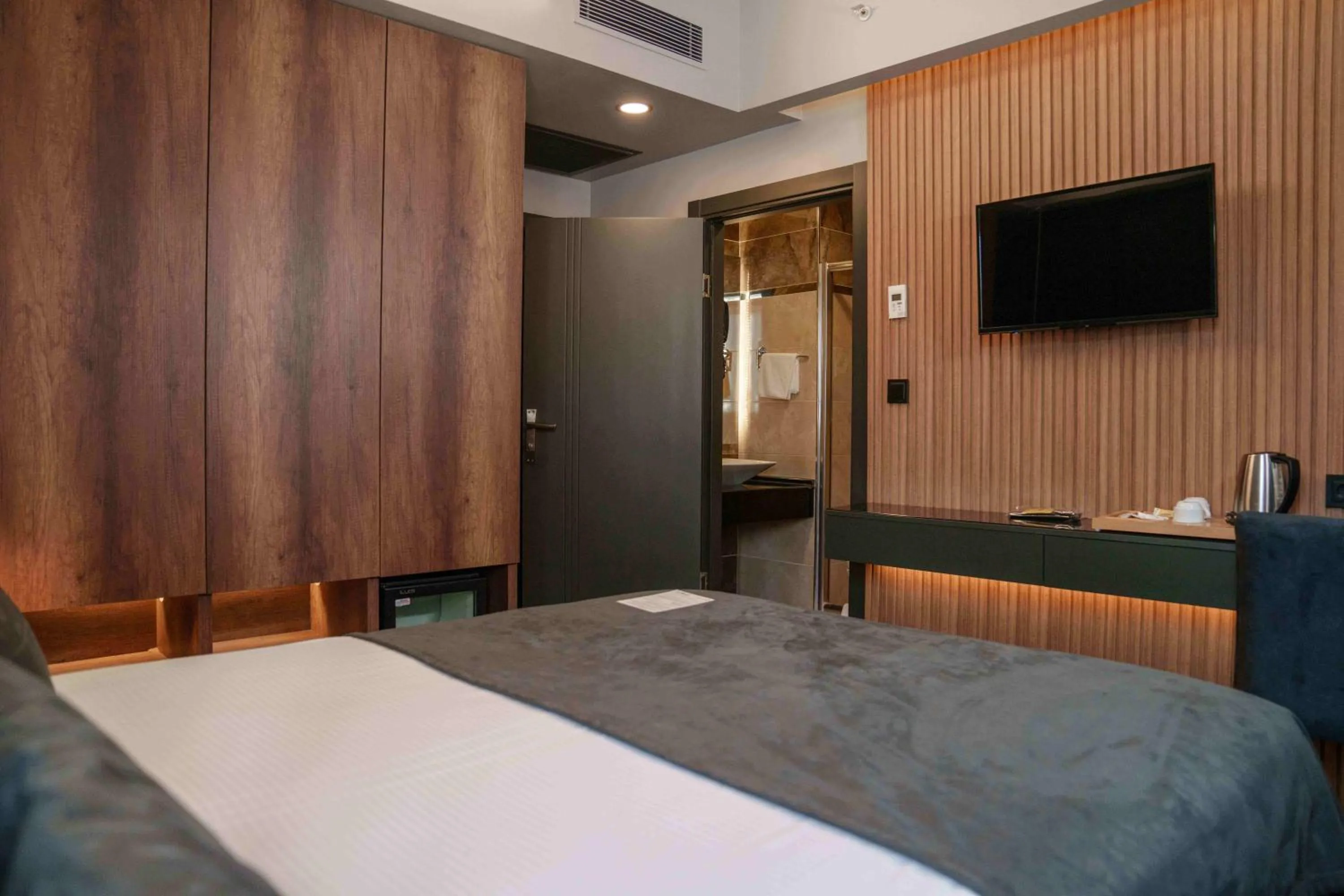 Bed in SennaCity Hotel