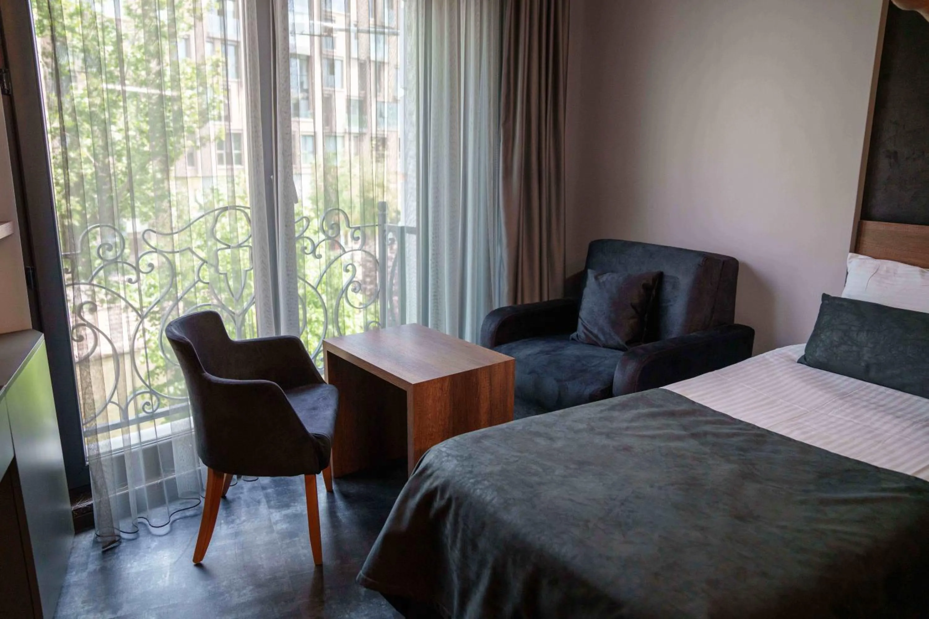 Bed in SennaCity Hotel