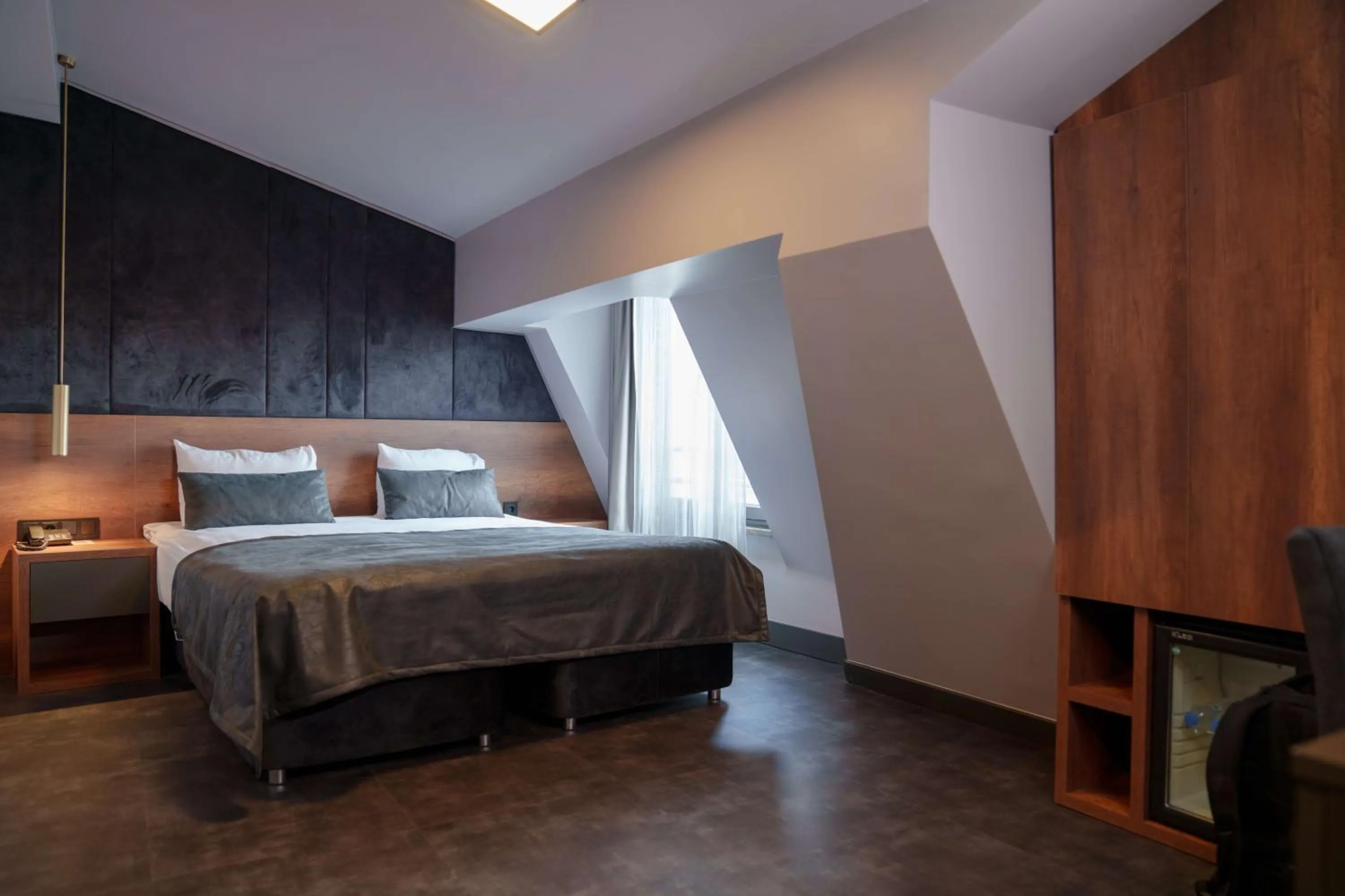 Bed in SennaCity Hotel