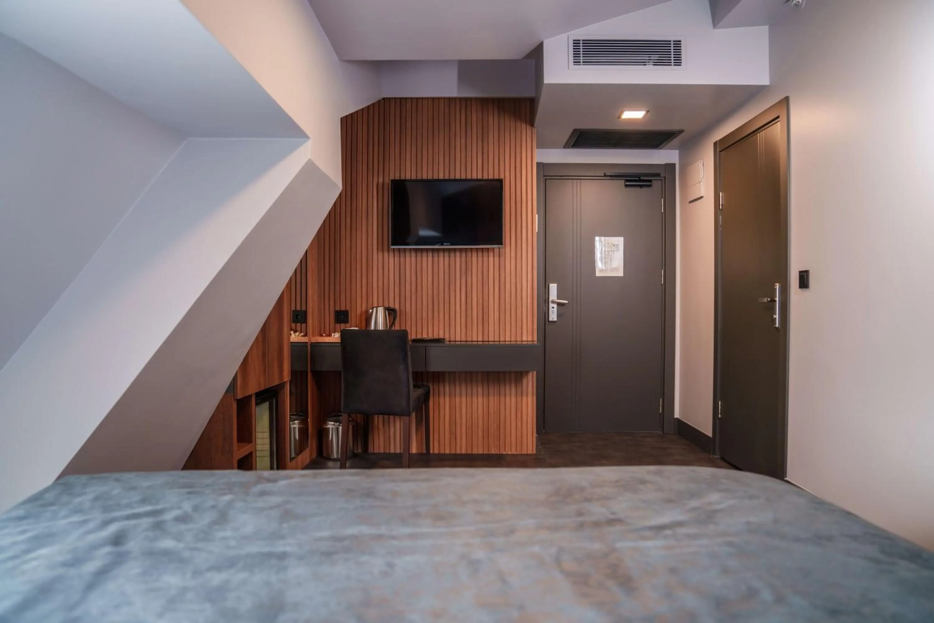 Bed in SennaCity Hotel