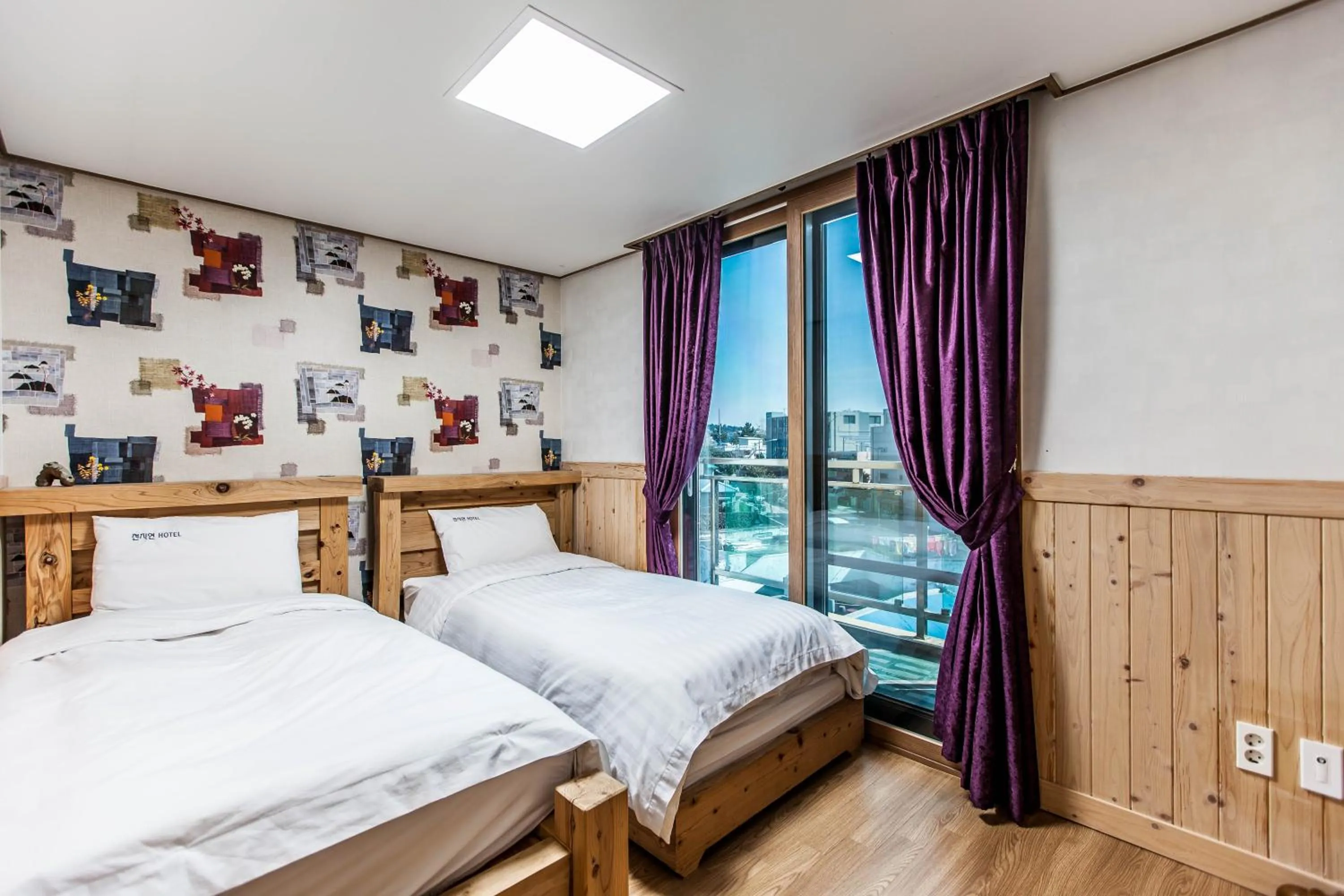 Bed in Cheonjiyeon Hotel