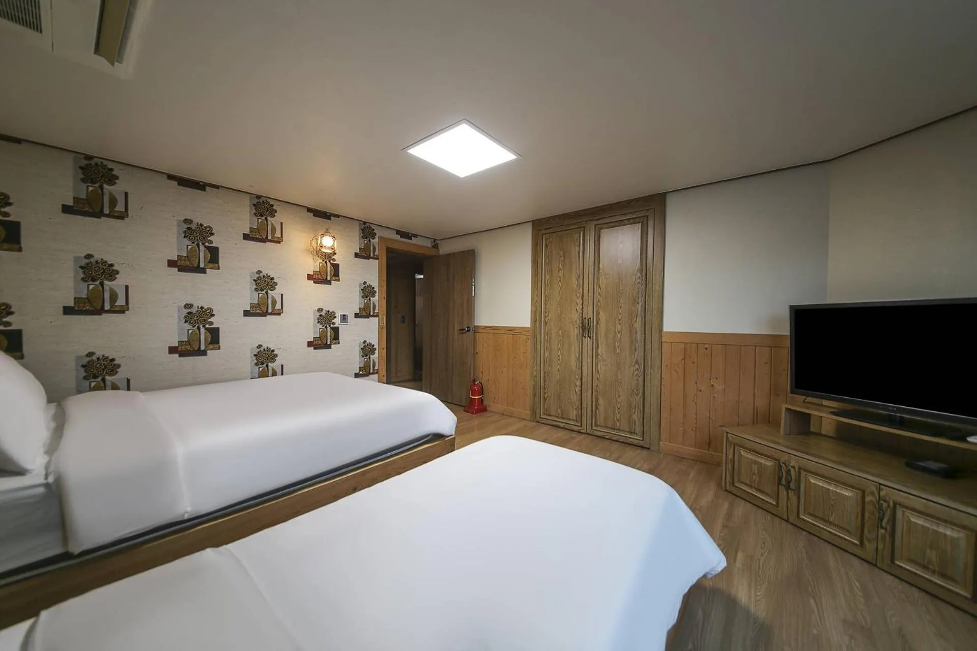 Bed in Cheonjiyeon Hotel