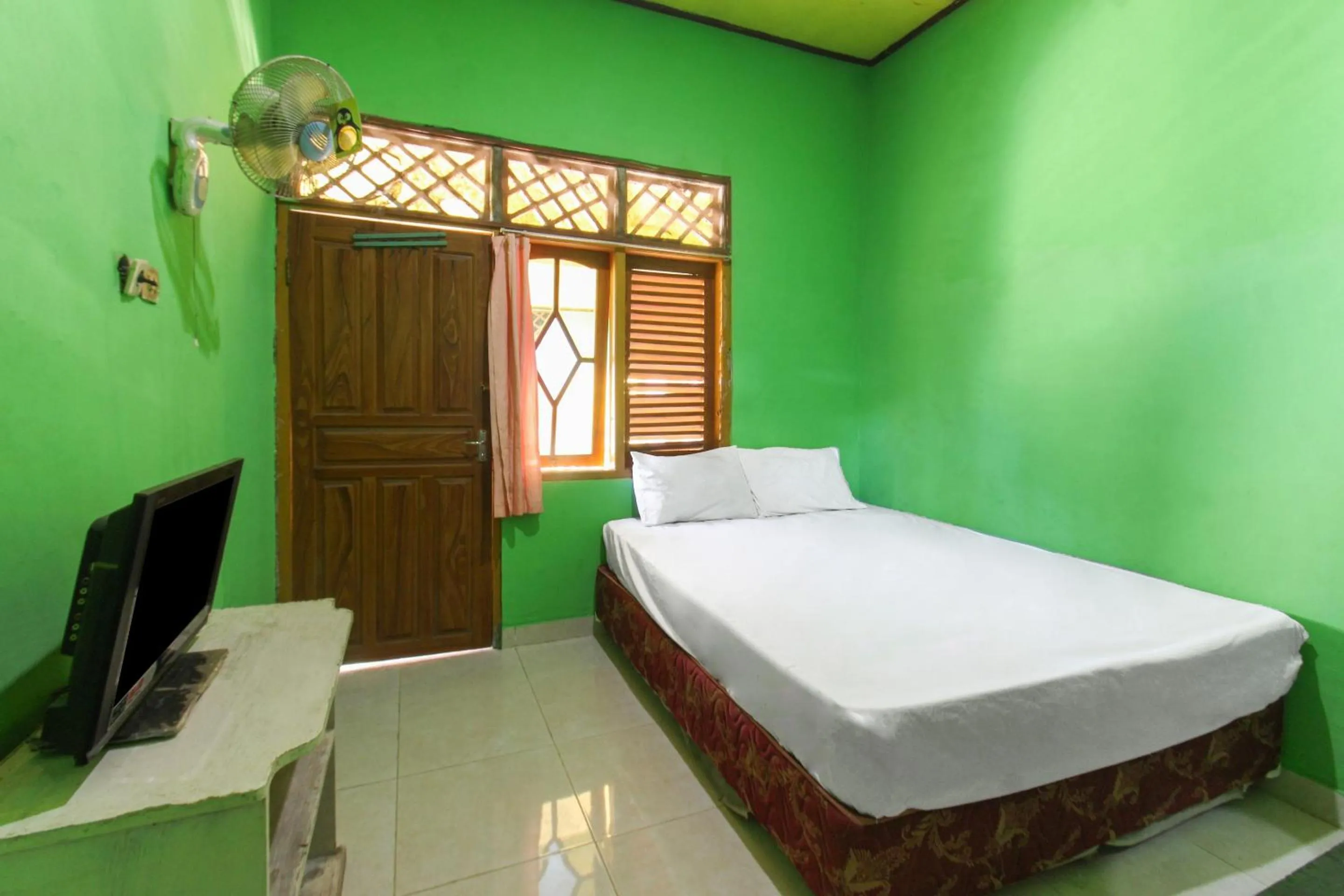 Bedroom in Hotel O Jayanni