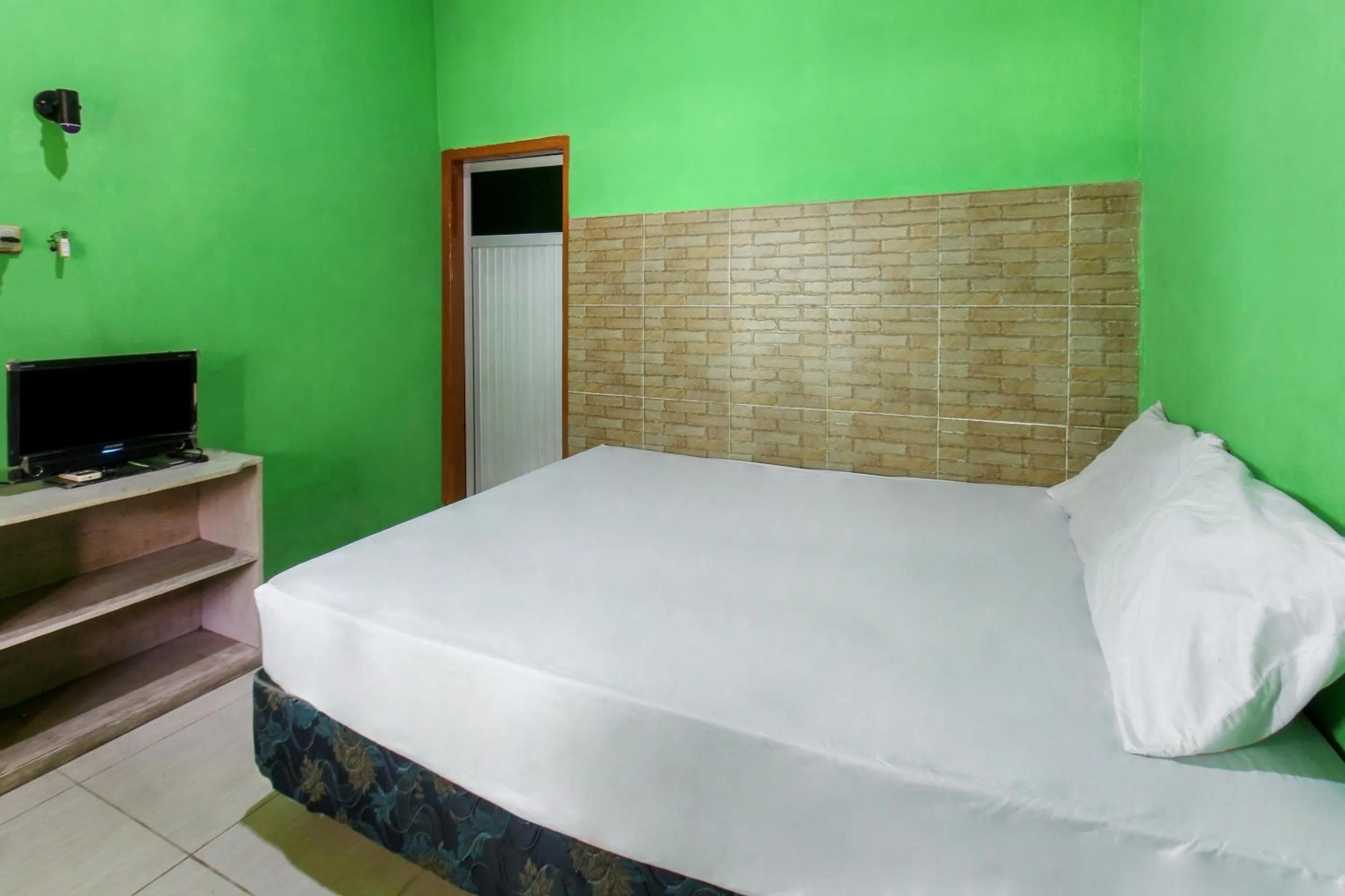 Bedroom in Hotel O Jayanni