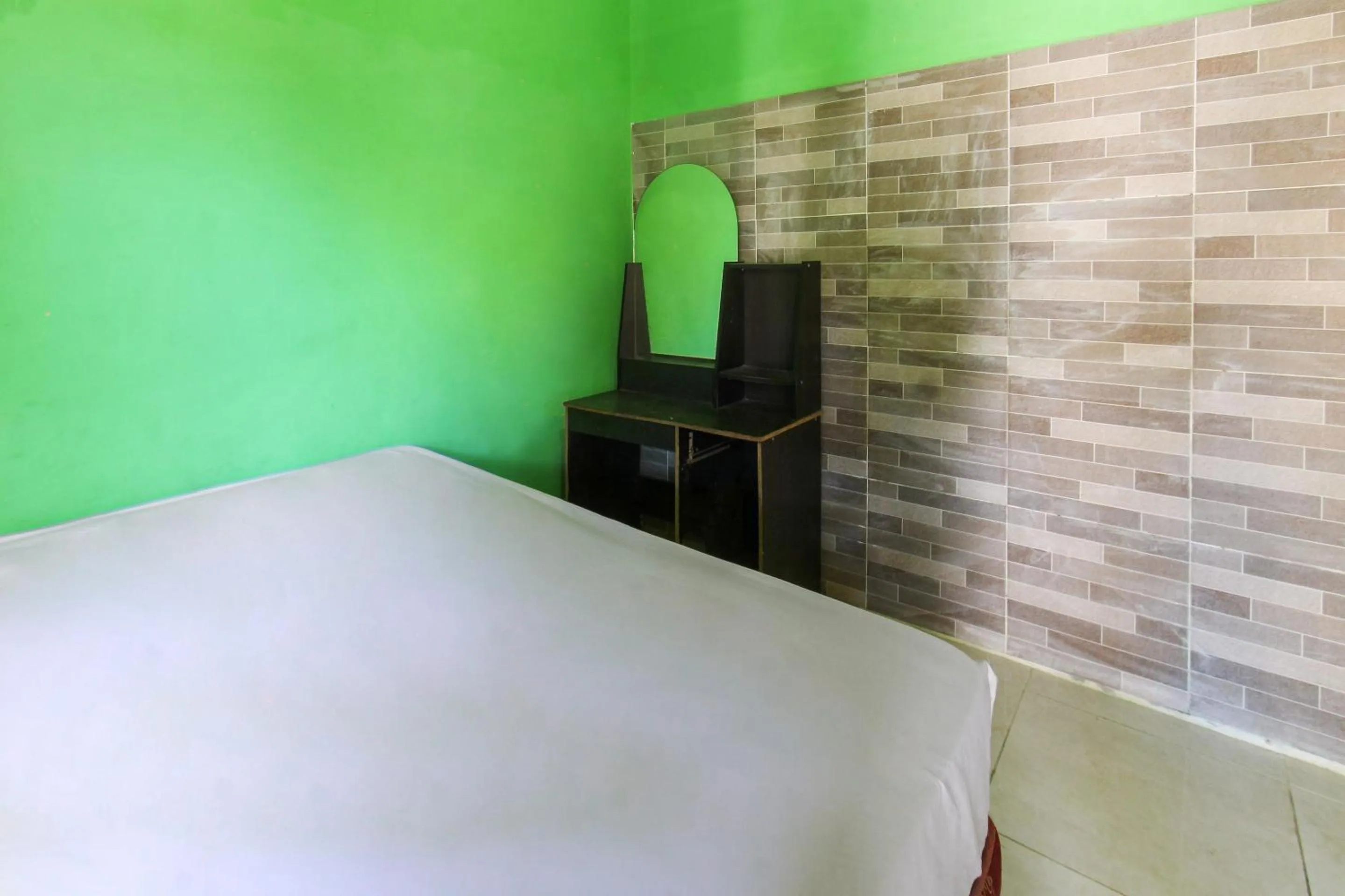 Bedroom in Hotel O Jayanni