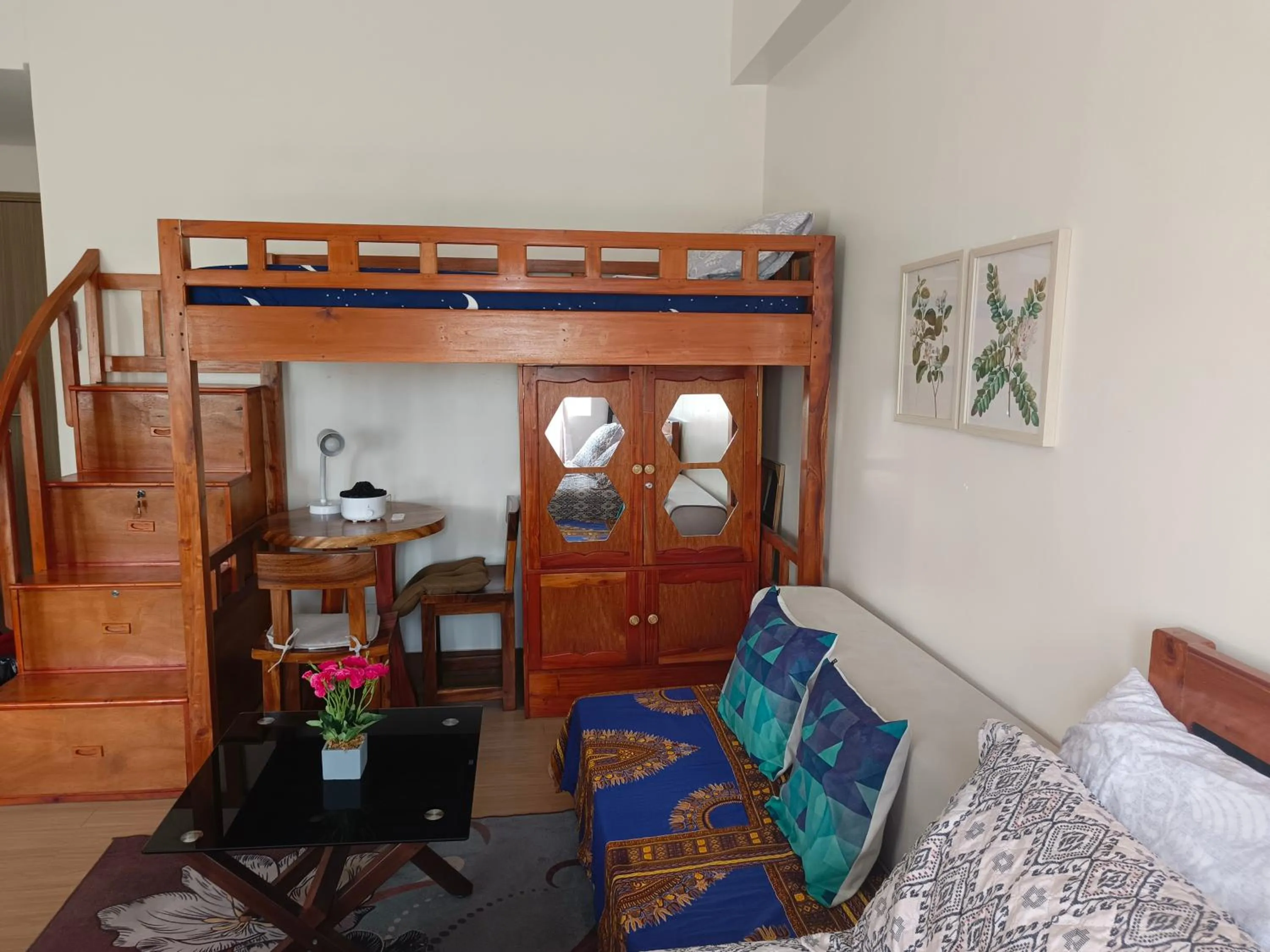 Bed in Happy Stays B - End Unit Greenery View at SMDC Hope Residences