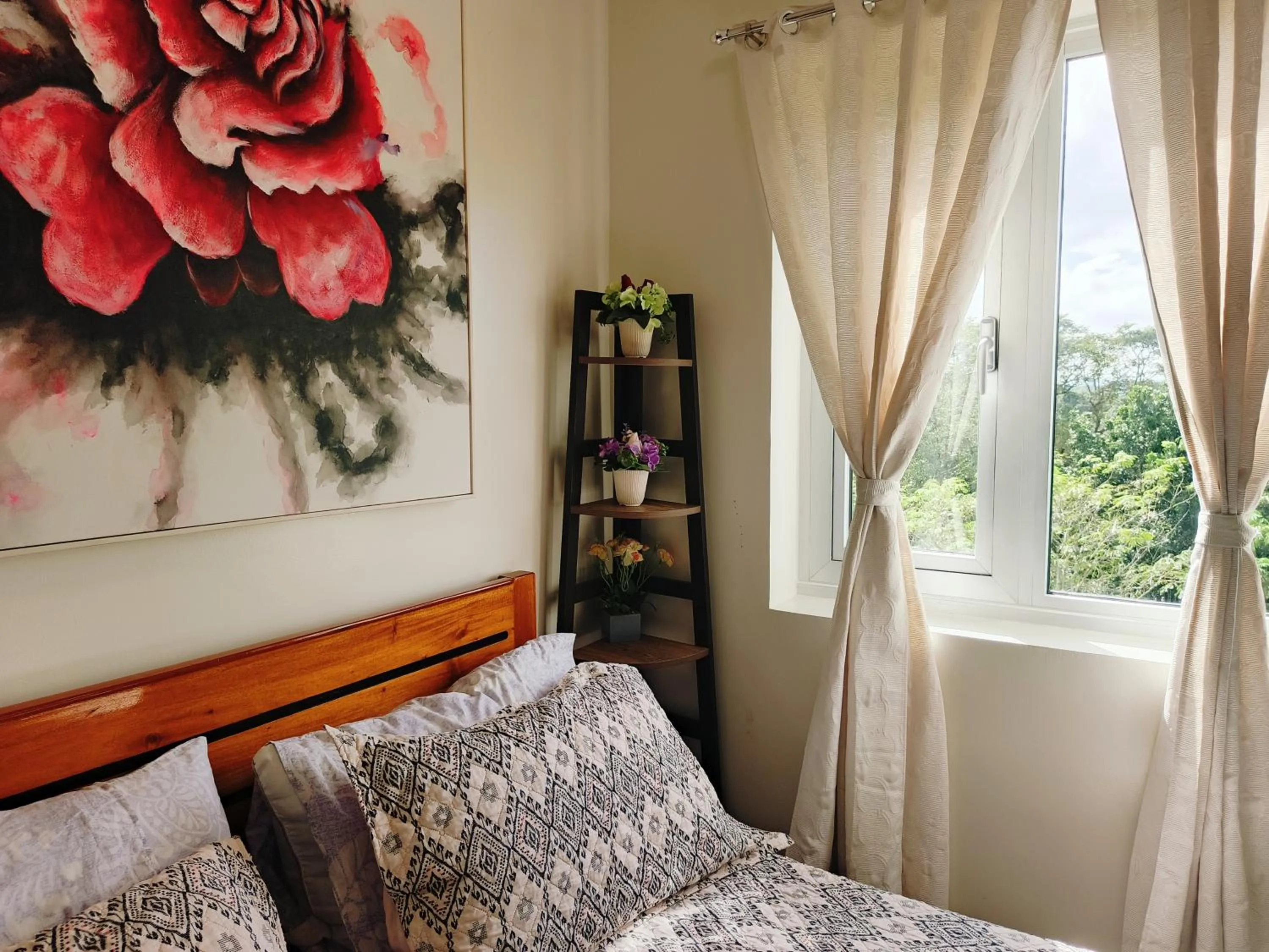 Bed in Happy Stays B - End Unit Greenery View at SMDC Hope Residences