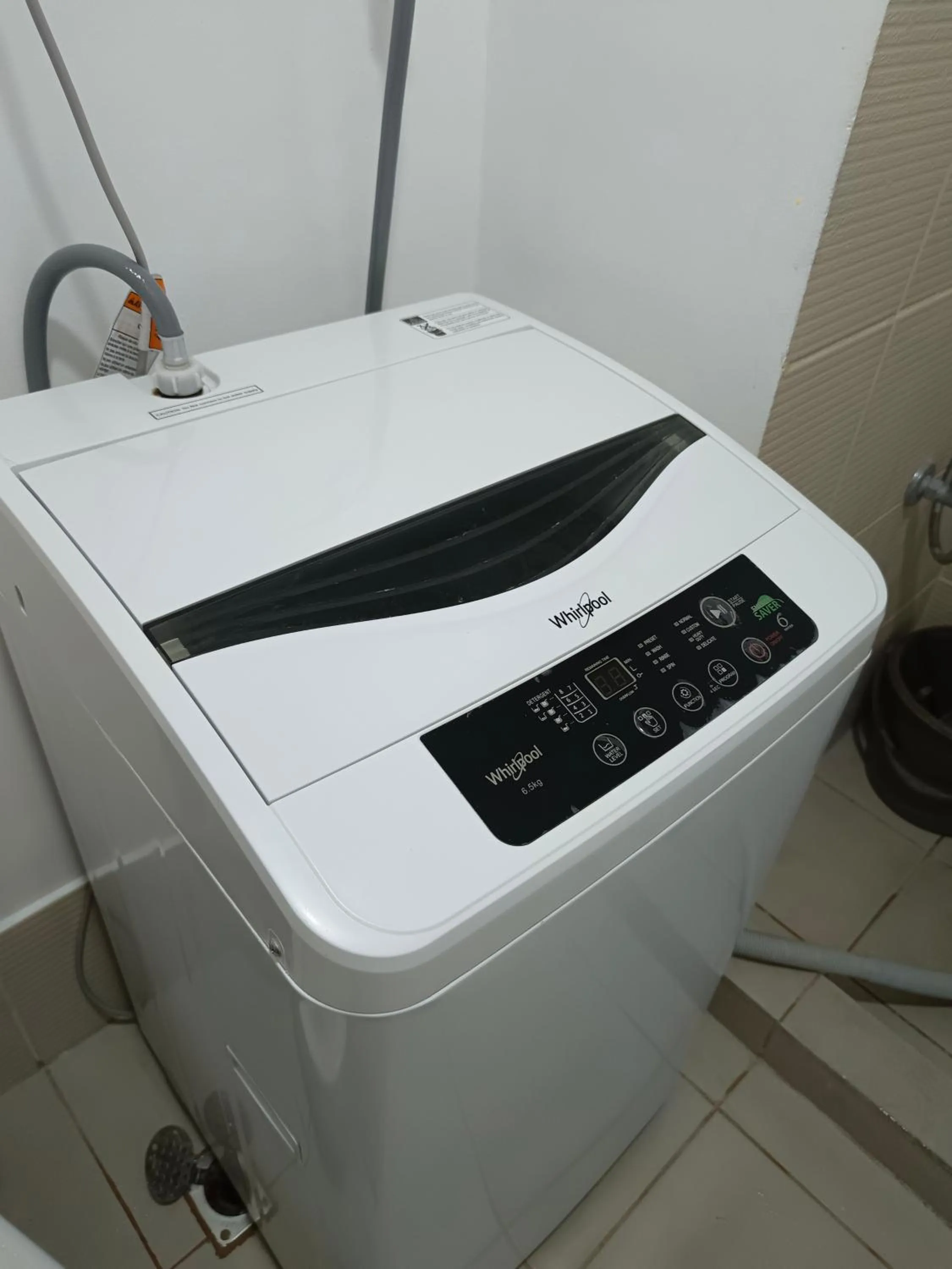washing machine in Happy Stays B - End Unit Greenery View at SMDC Hope Residences