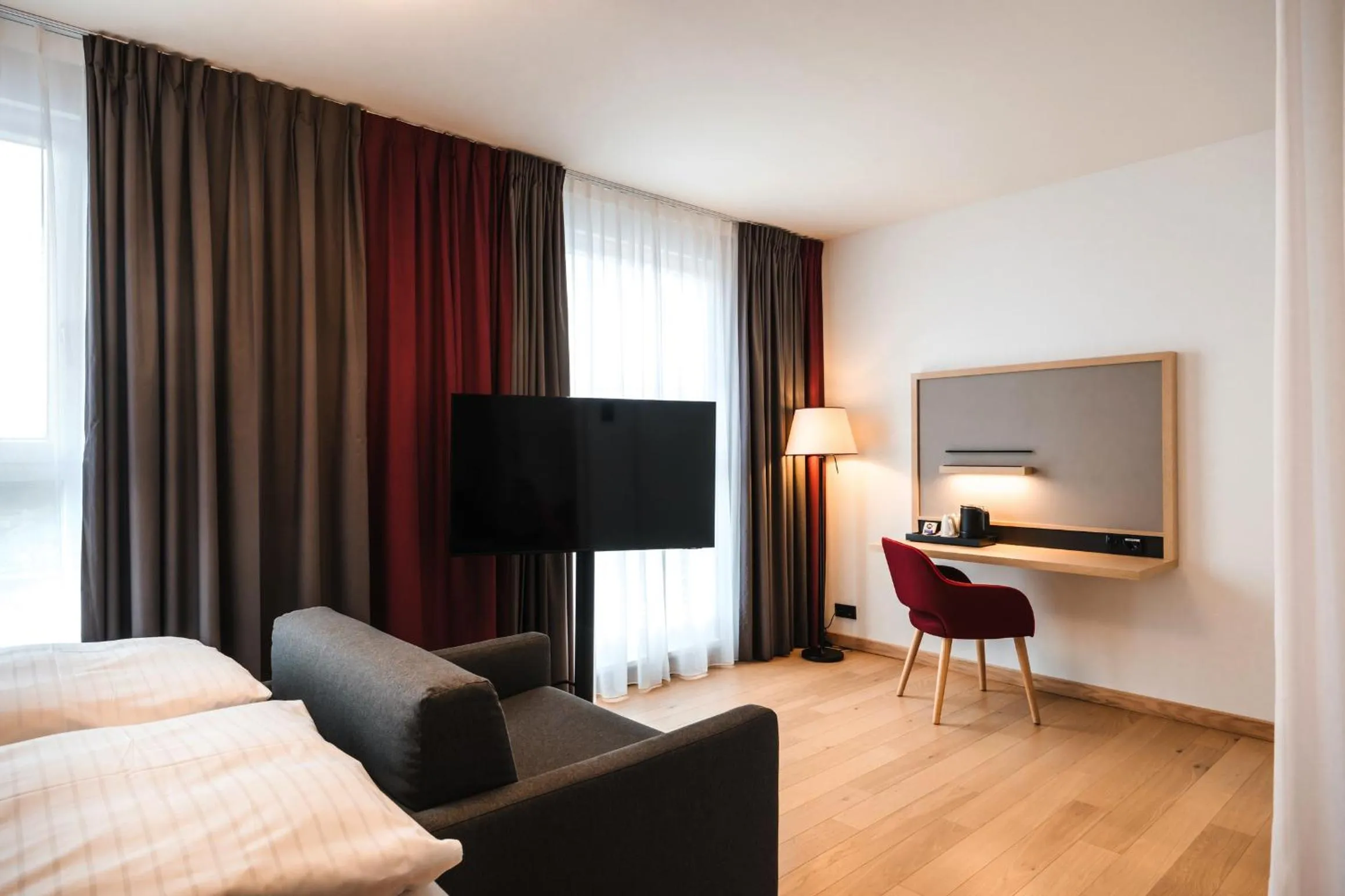 Photo of the whole room, Bed in IntercityHotel Lübeck
