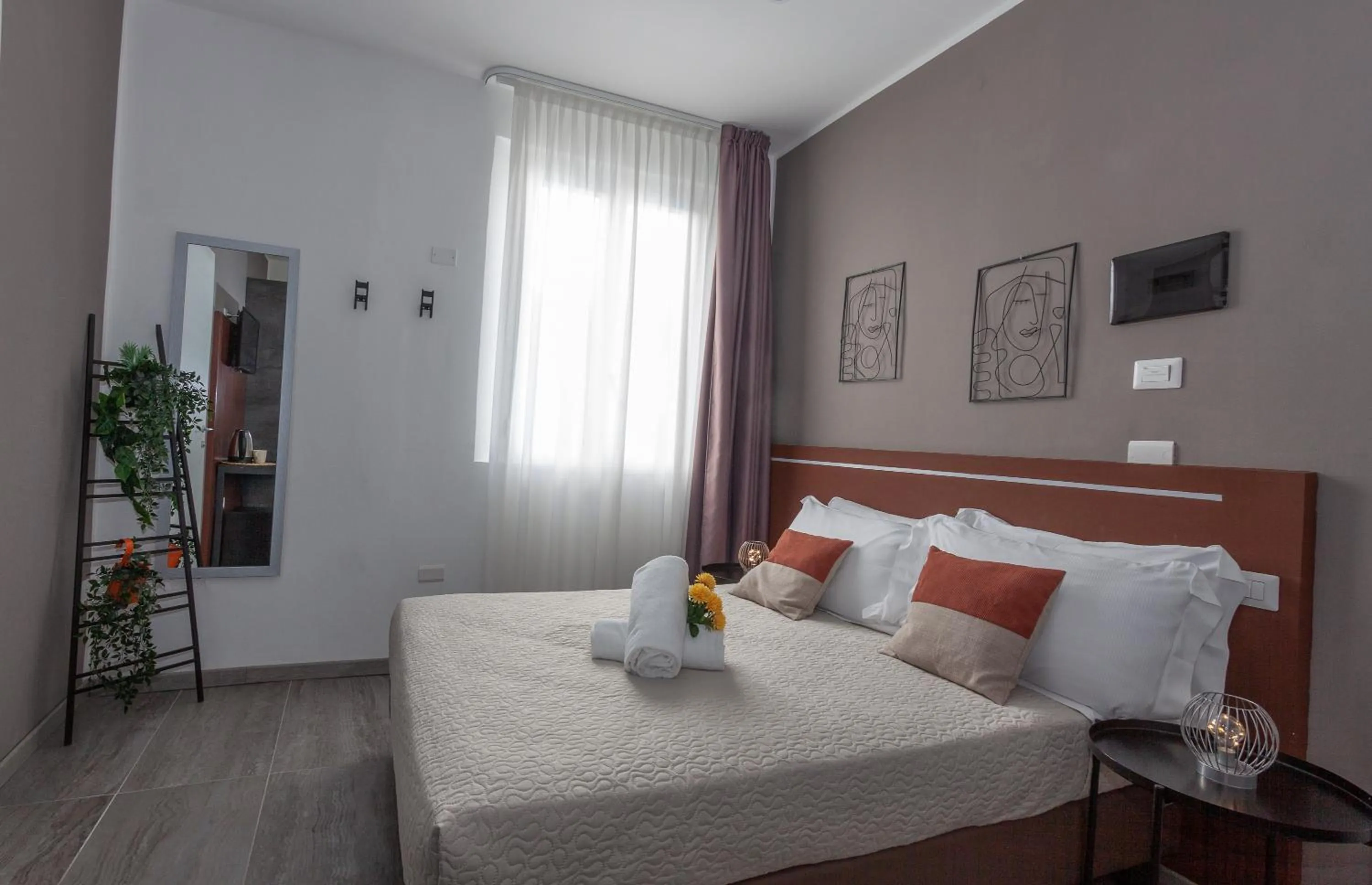 Bed in Hotel apartments Crisvan