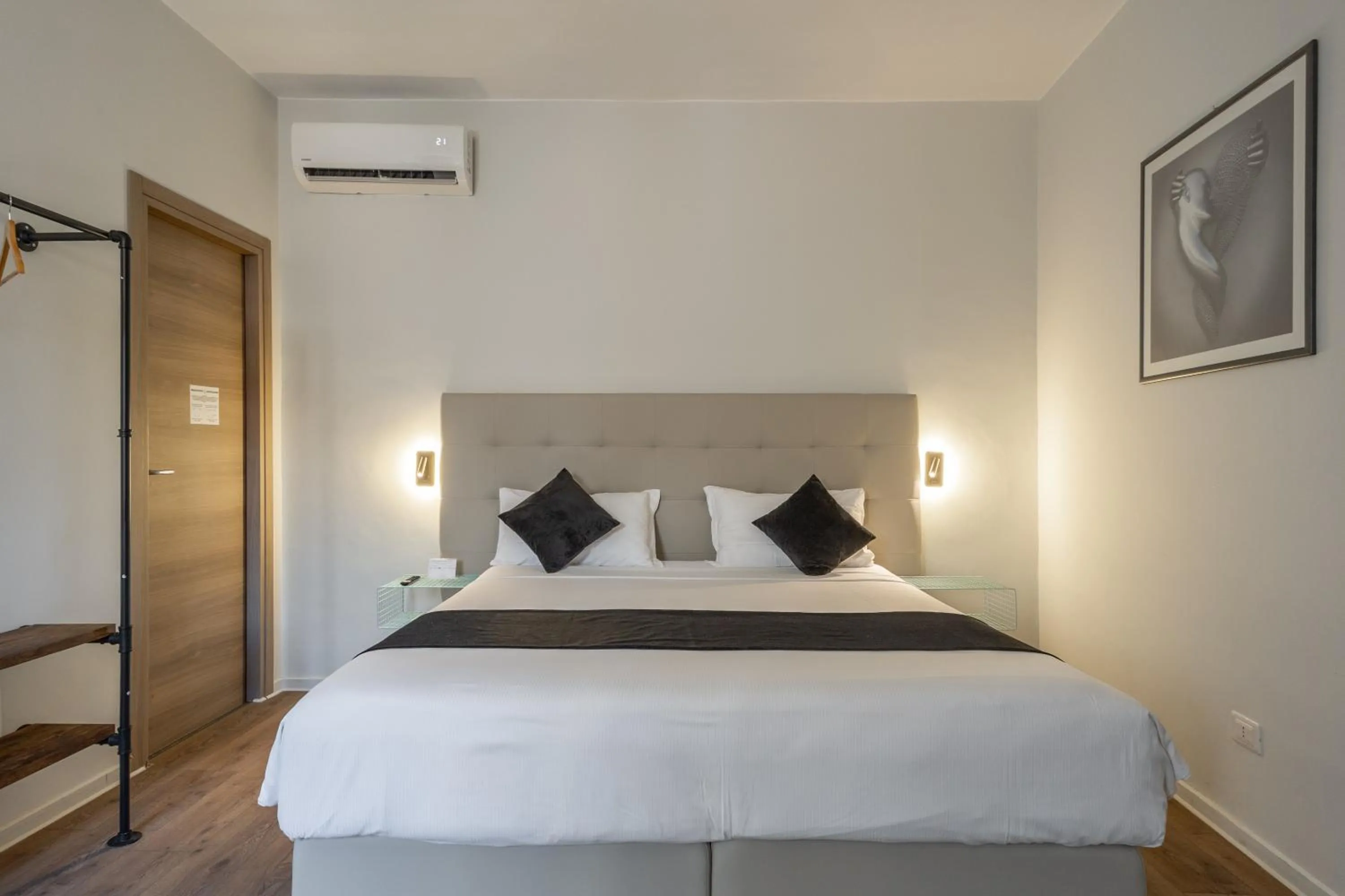 Bed in SOHO Piaggiarelle by Dasso - Guest House