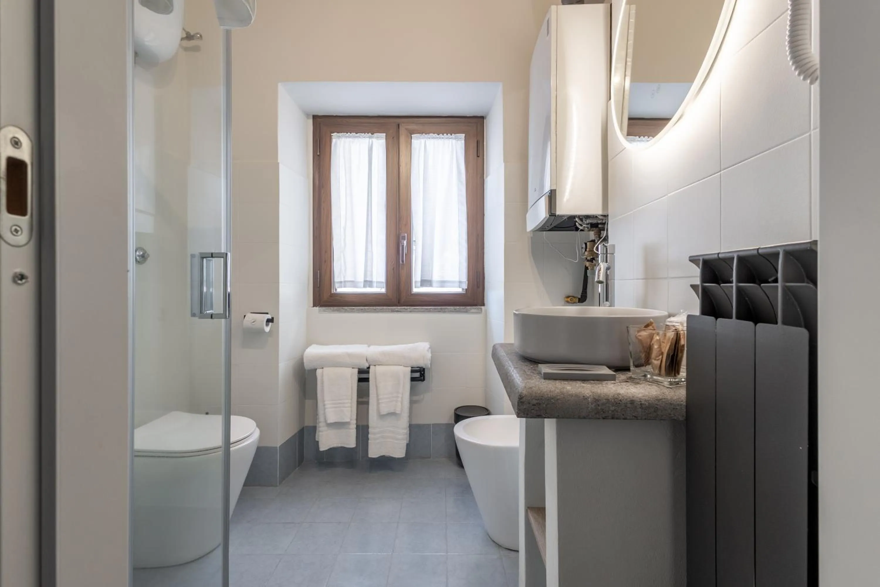 Bathroom in SOHO Piaggiarelle by Dasso - Guest House