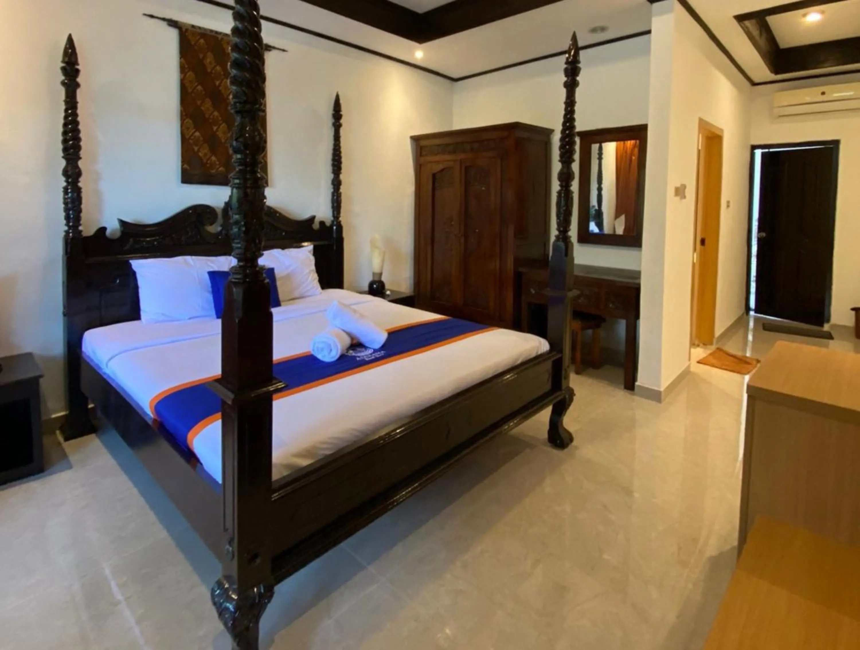 Bed in New Adirama Beach Hotel