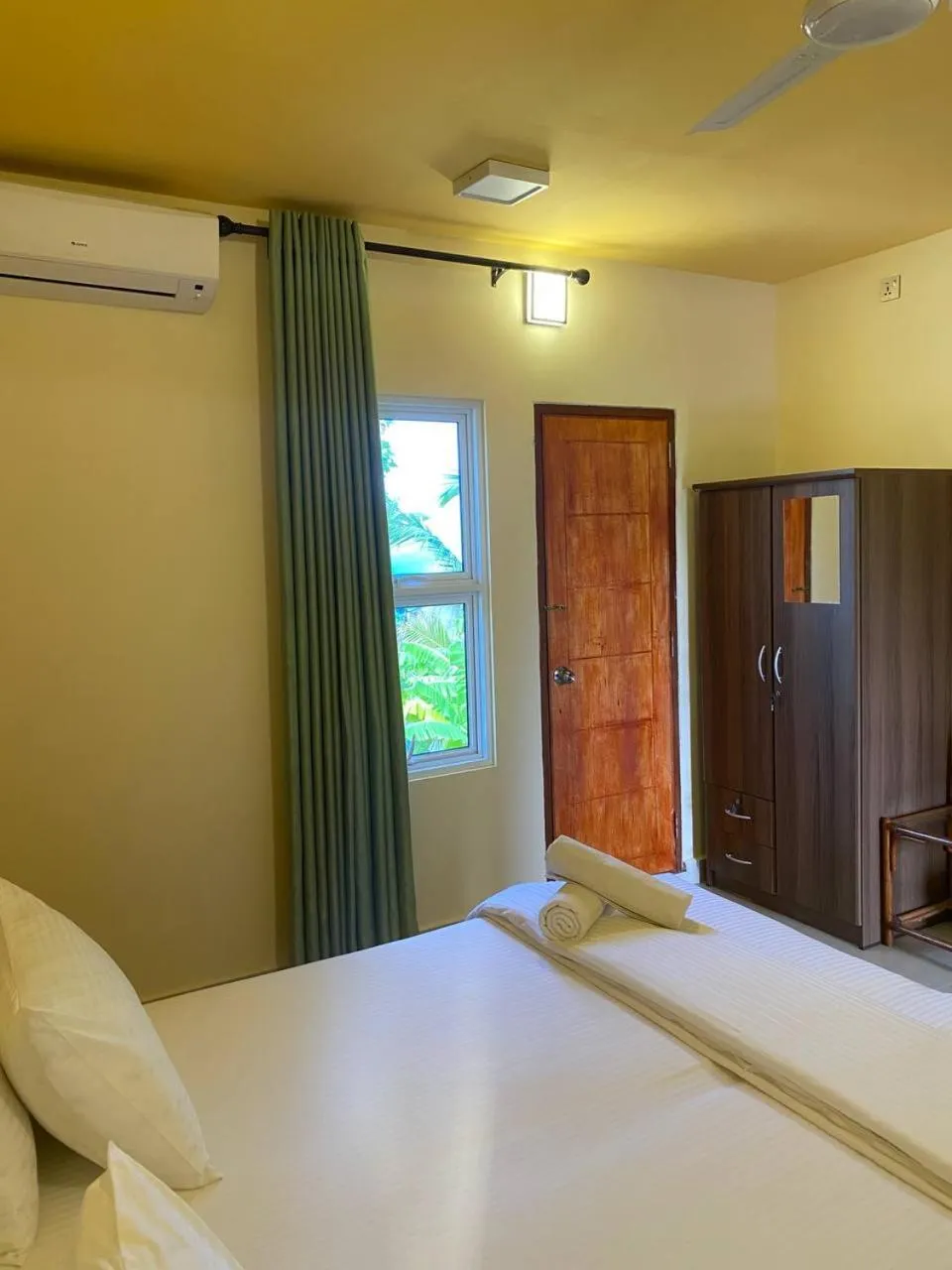 Bed in White Sand Inn