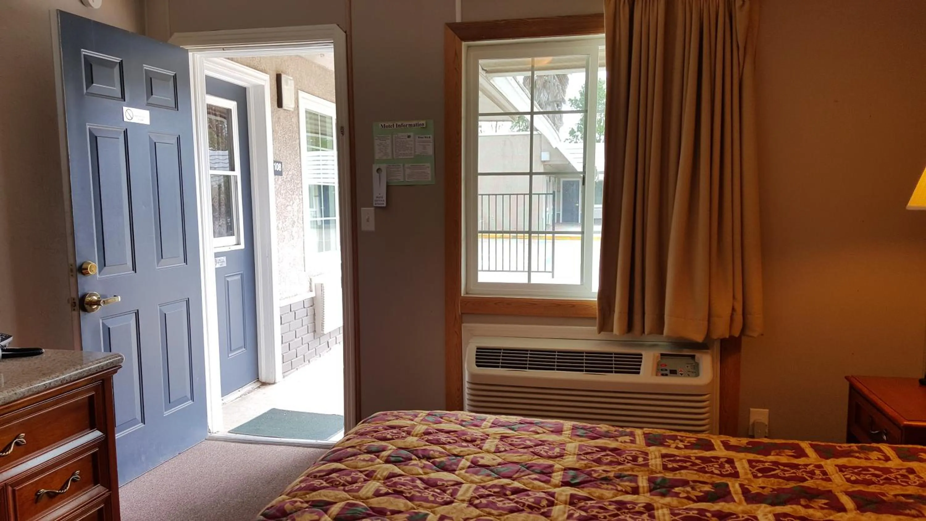 Bed in Pacific Motel