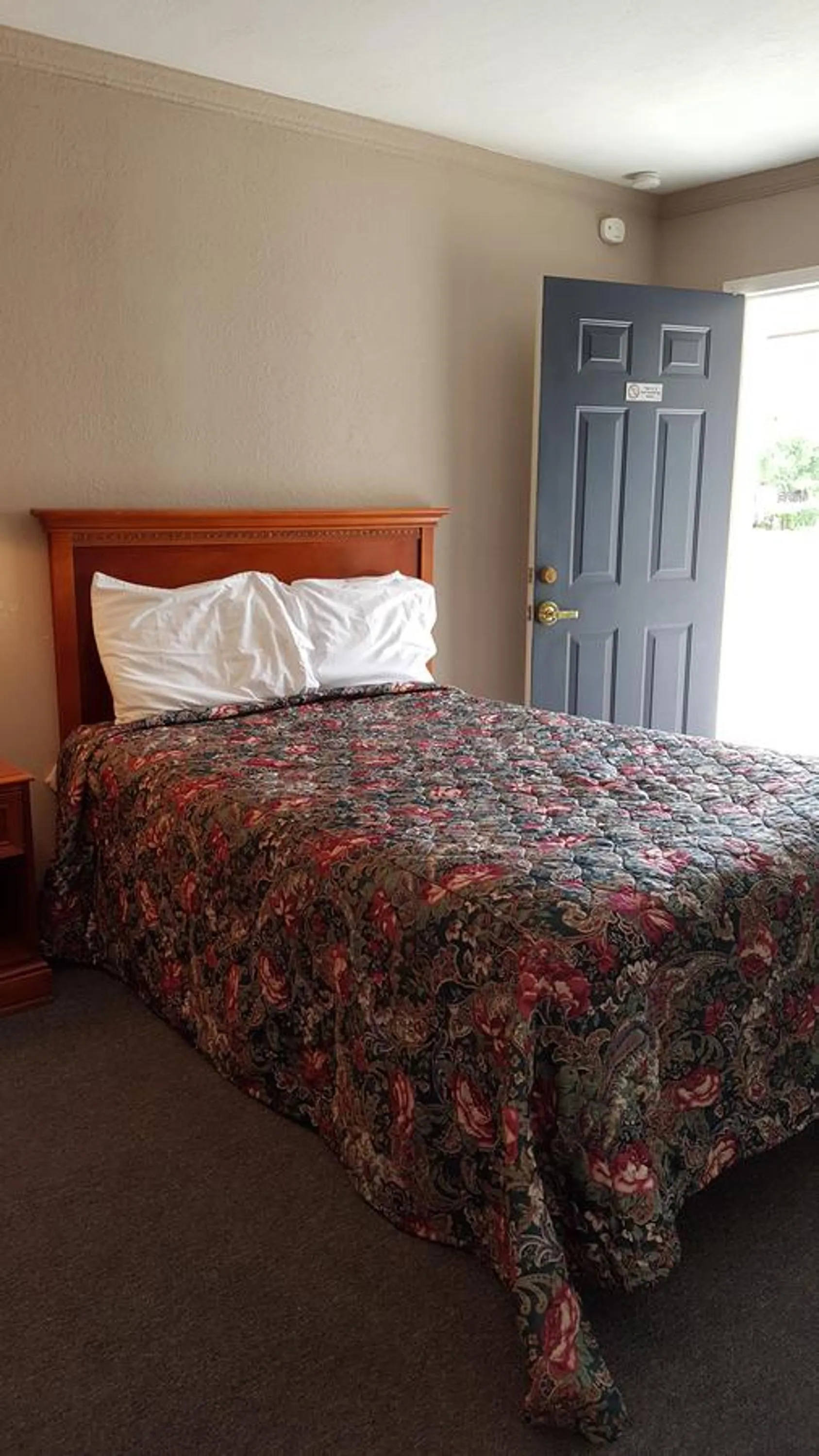 Bed in Pacific Motel