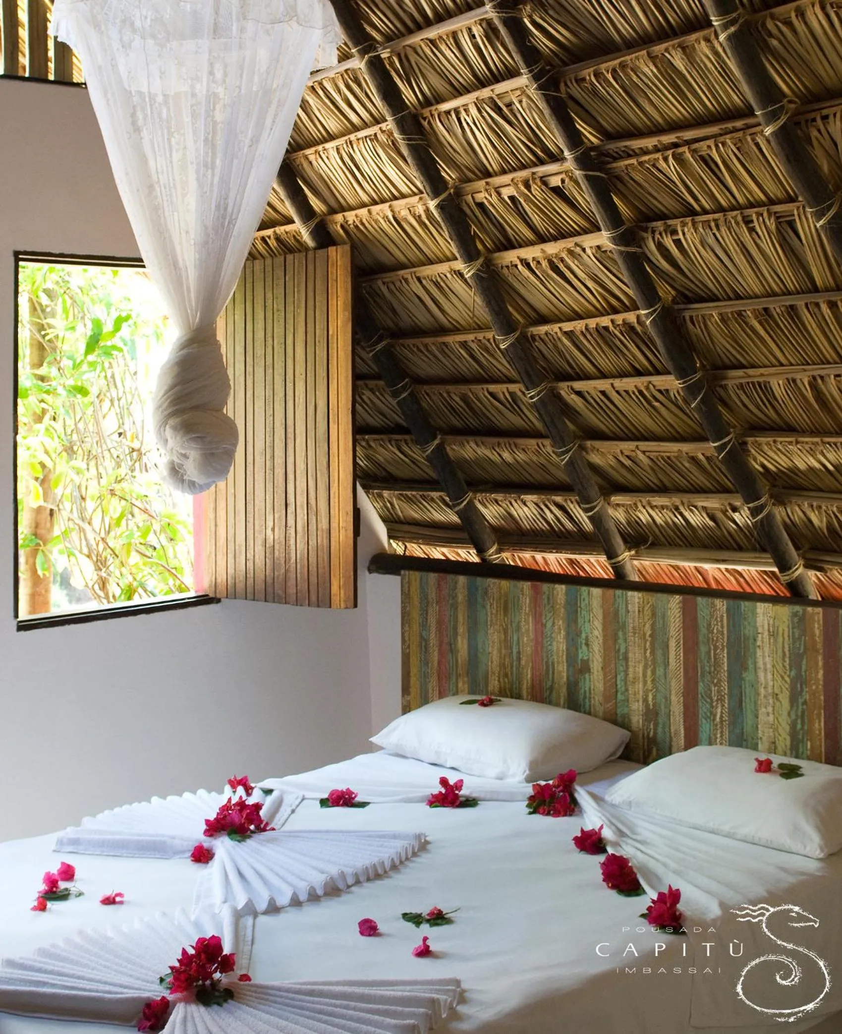 Photo of the whole room, Bed in Pousada Capitù