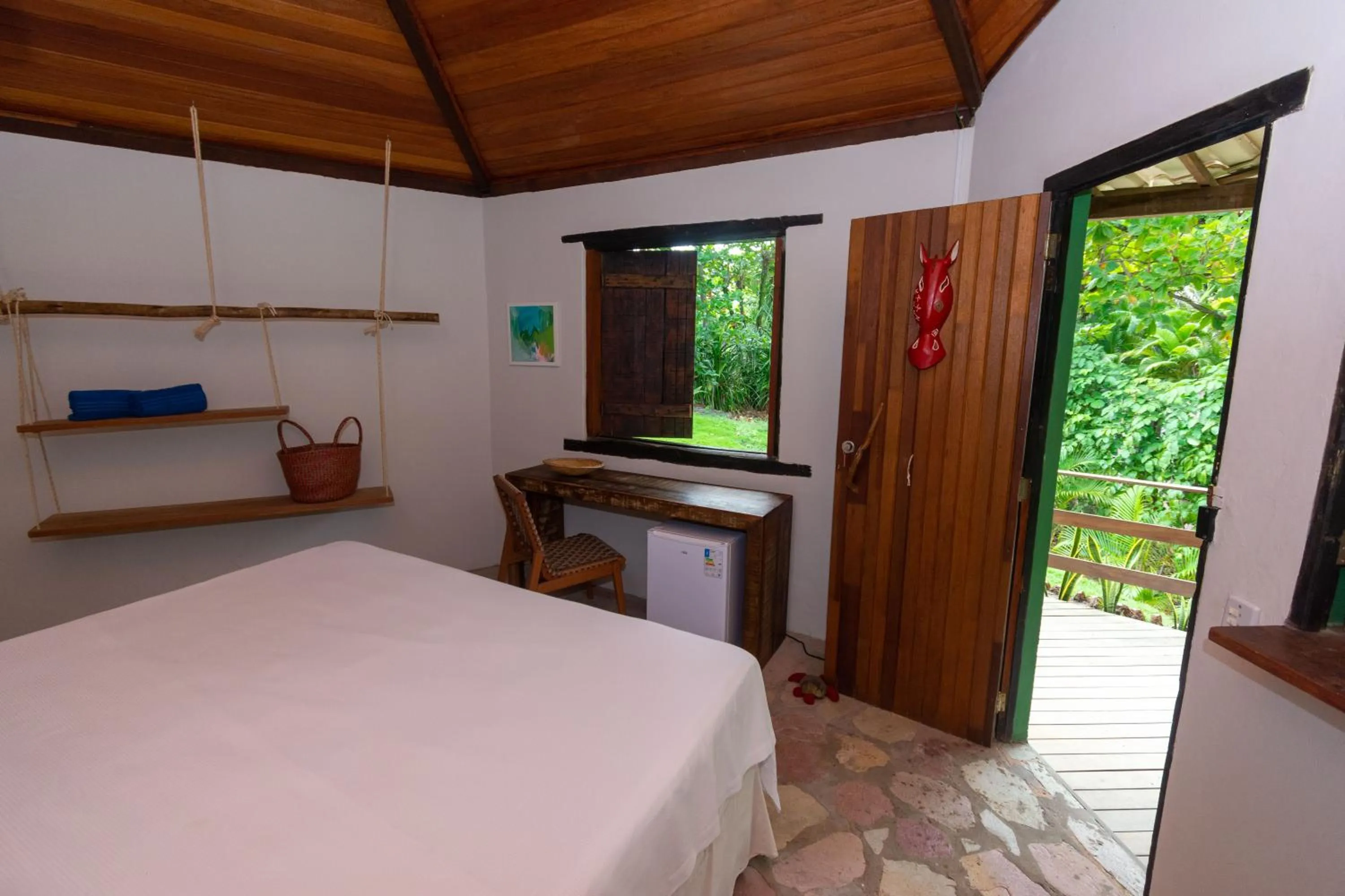 Photo of the whole room, Bed in Pousada Capitù