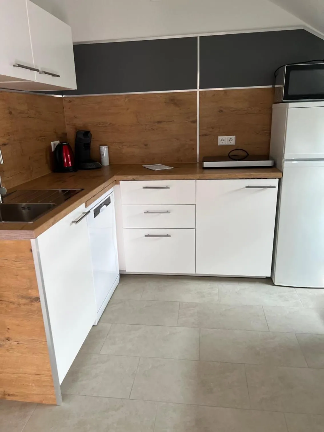 Kitchen or kitchenette in New Age Boardinghaus Bad Wimpfen