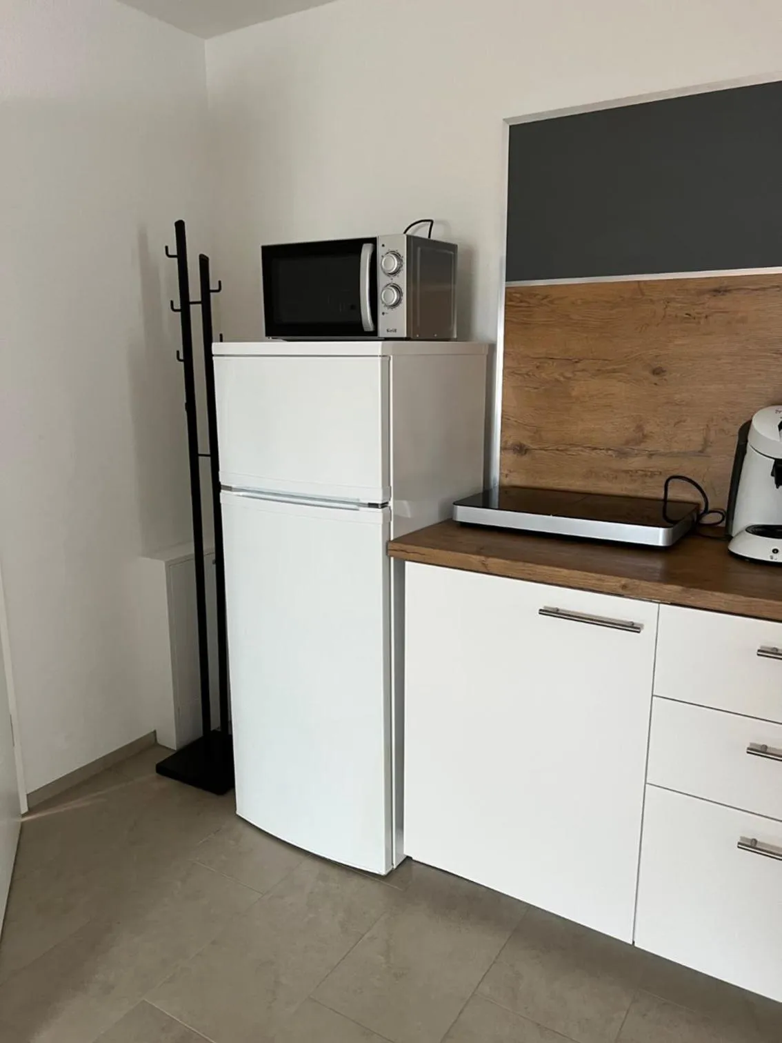 Kitchen or kitchenette in New Age Boardinghaus Bad Wimpfen