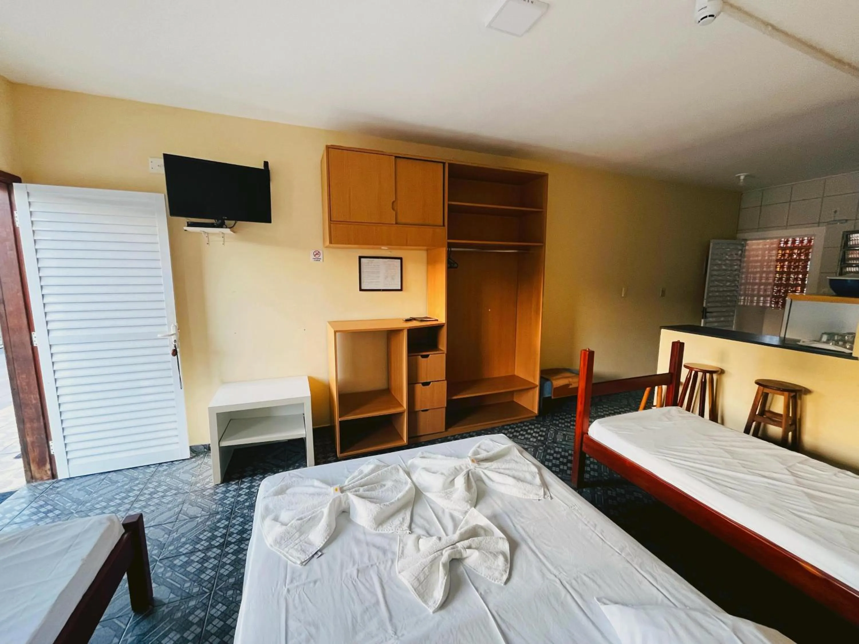 Bed in Pousada Caraguá