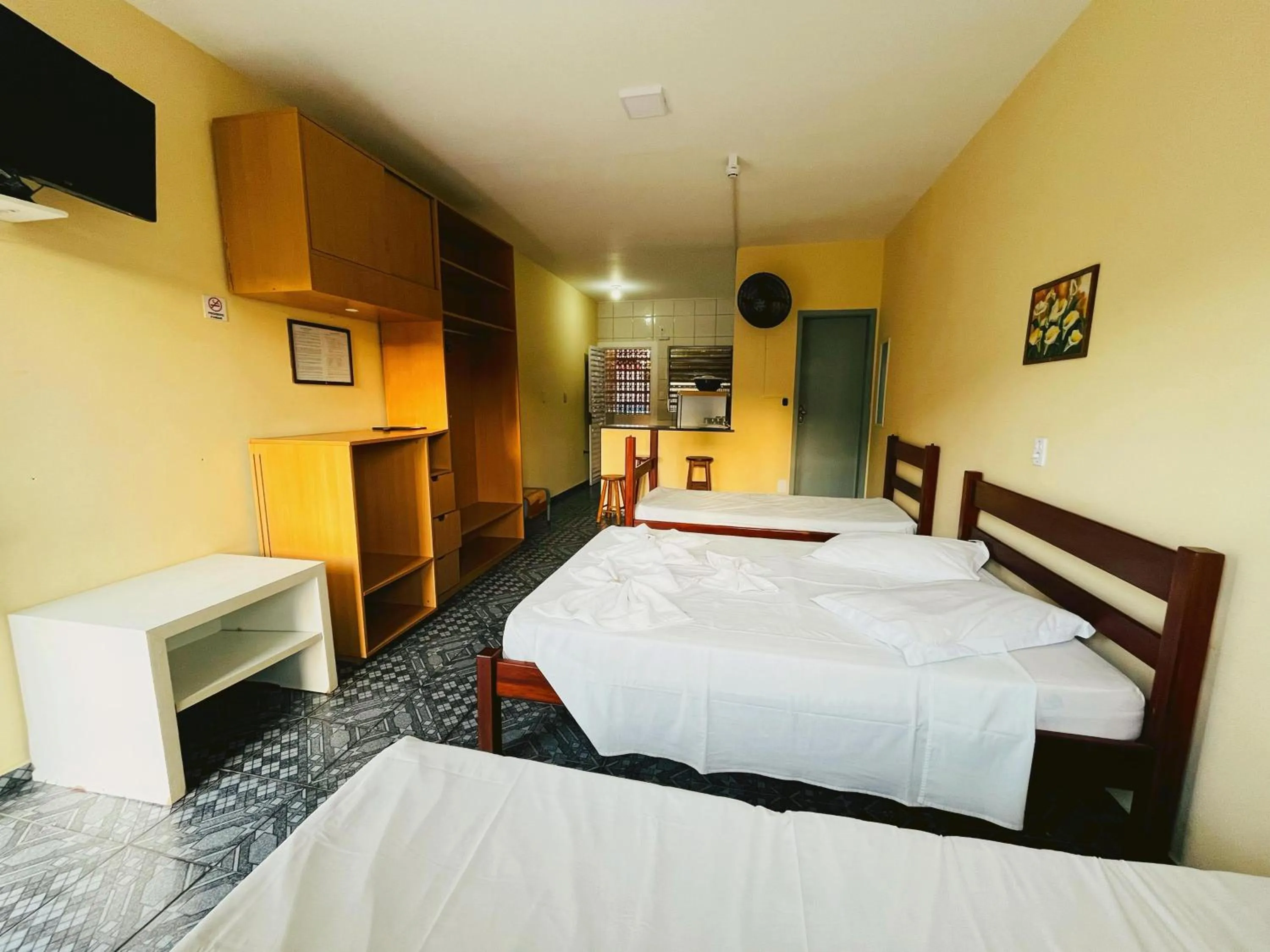 Bed in Pousada Caraguá