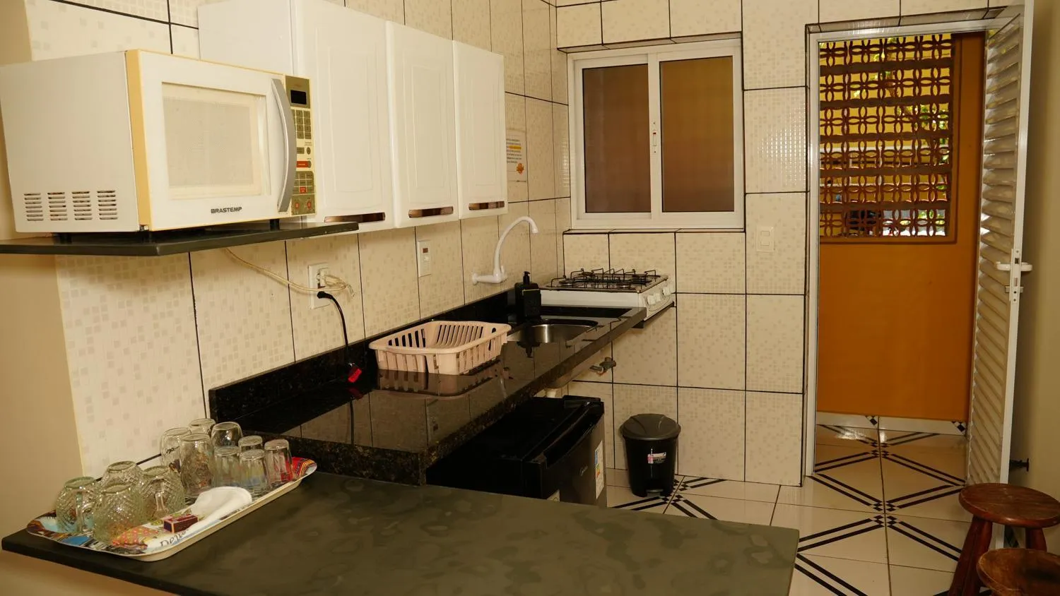 Kitchen or kitchenette in Pousada Caraguá