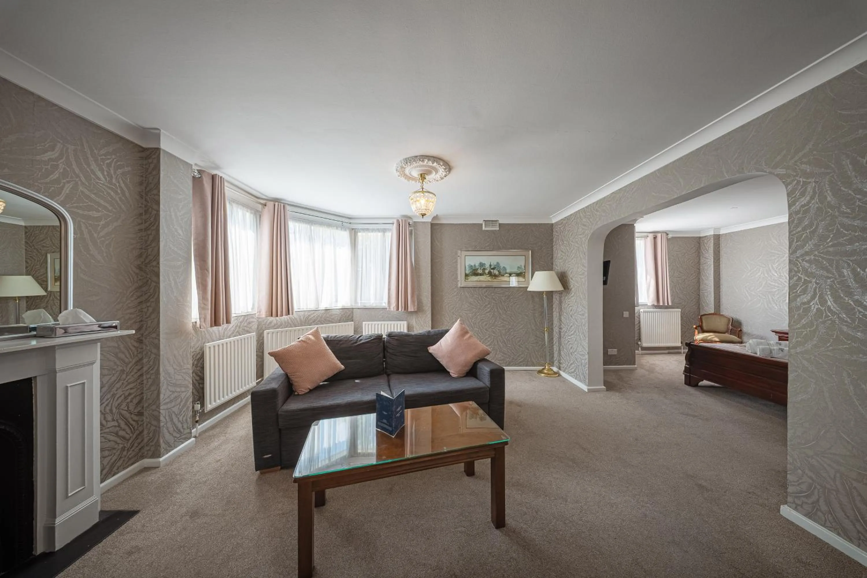 Bedroom in The Clarendon Hotel