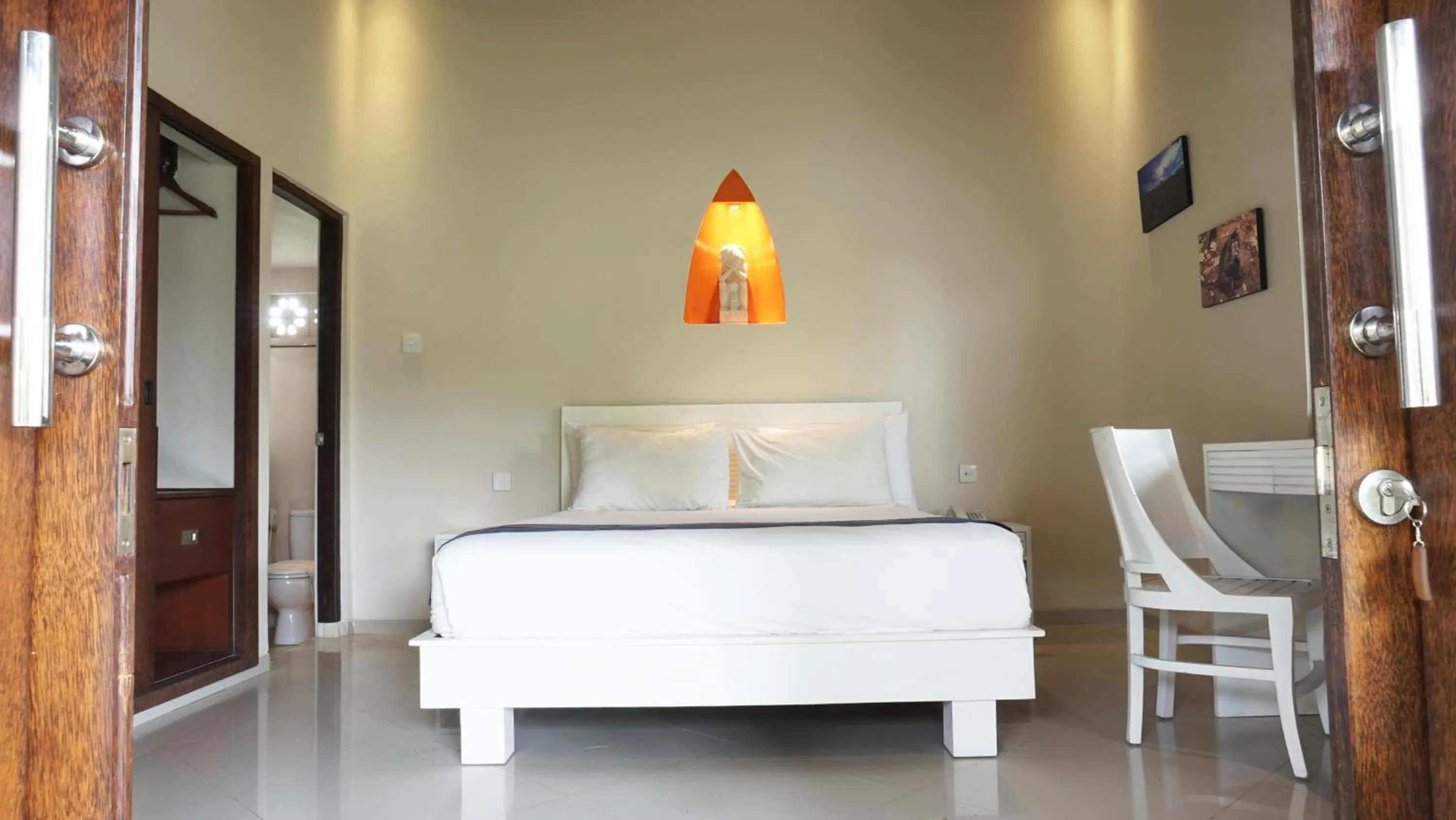 Bed in Puri Rinjani Bungalows