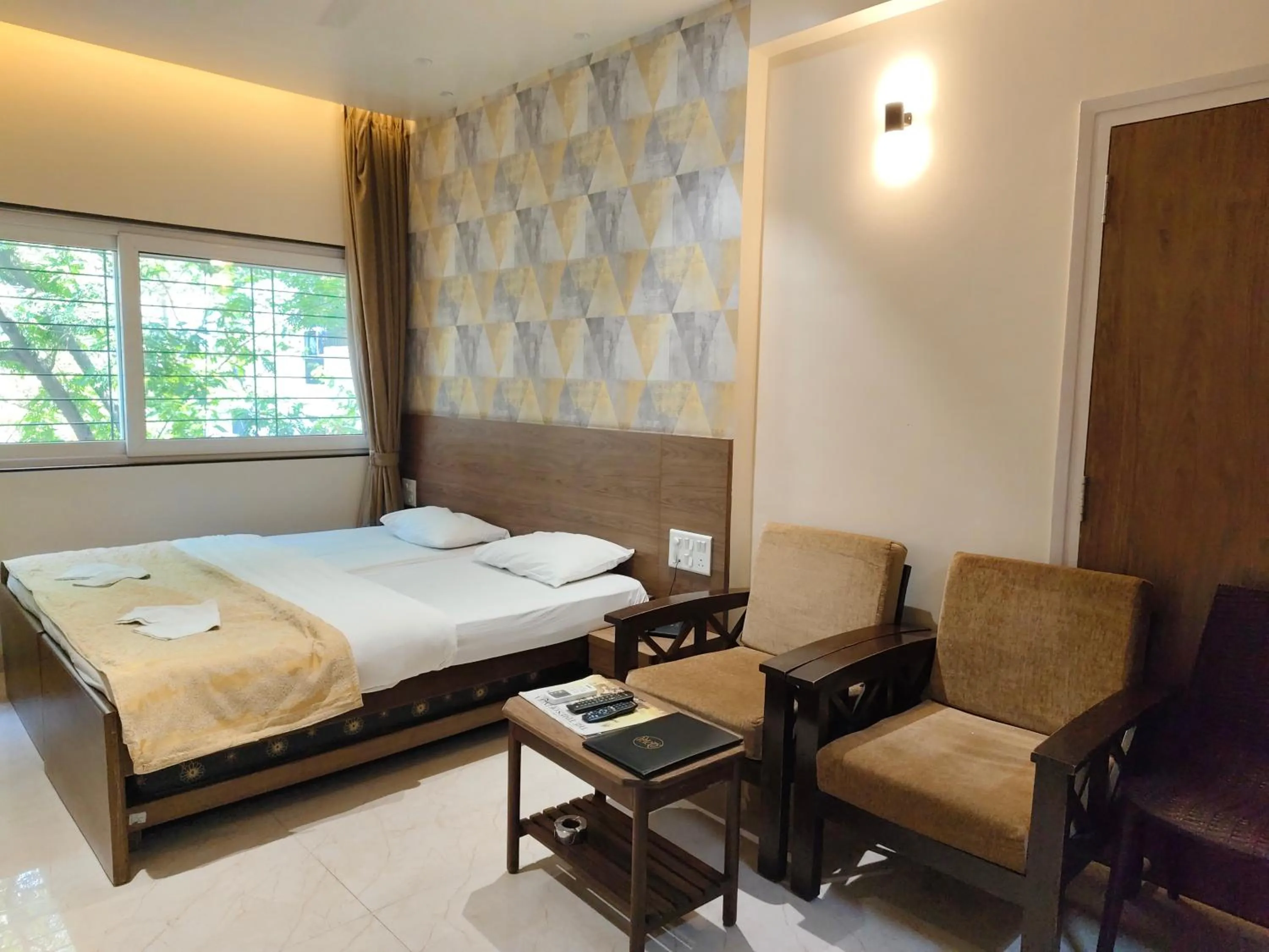 Photo of the whole room, Bed in Hotel Shreyas