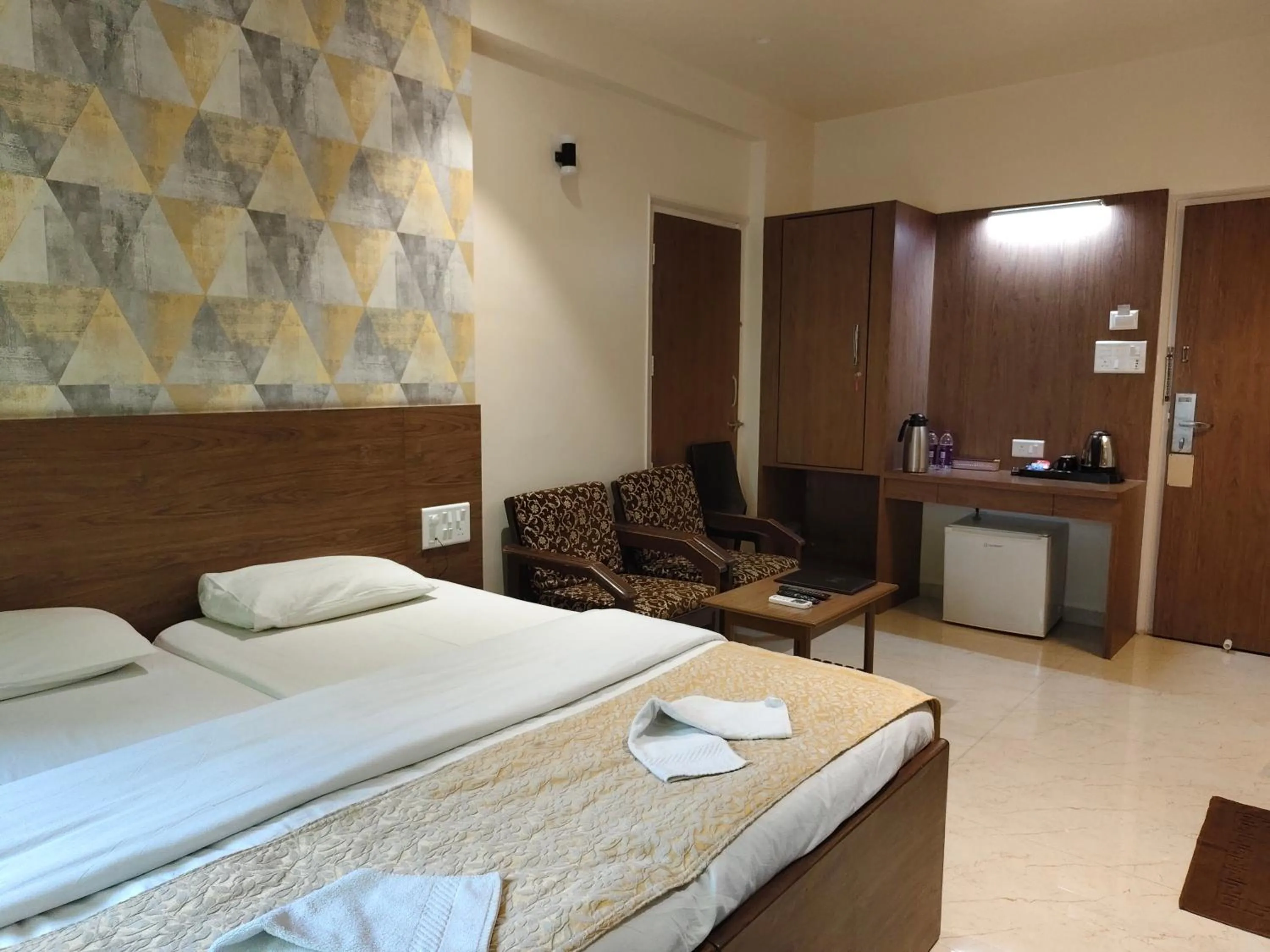 Photo of the whole room, Bed in Hotel Shreyas