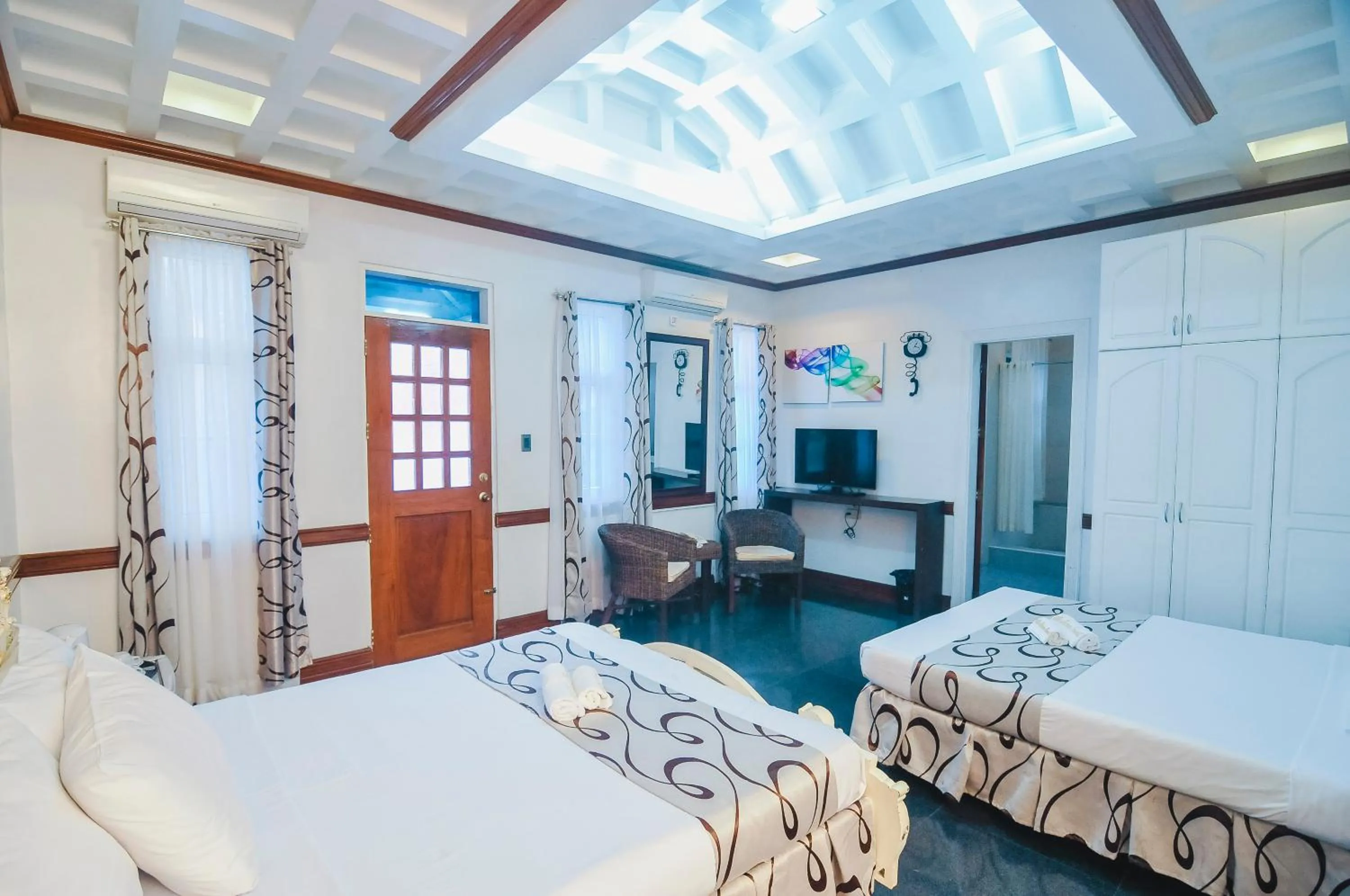 Photo of the whole room, Bed in Villa Jhoana Resort