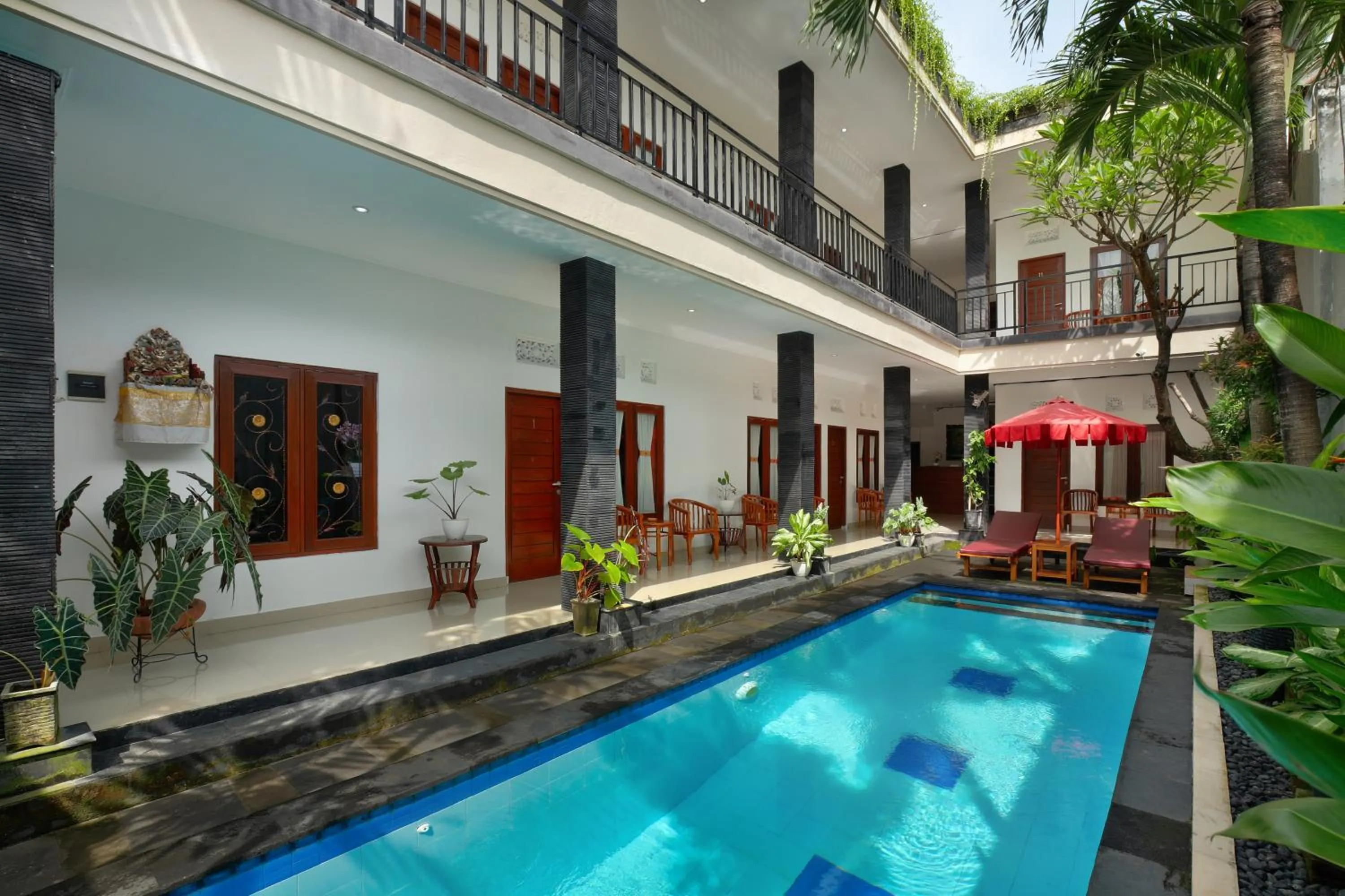 Swimming pool in Graha Wedha Suite Kuta by kamara