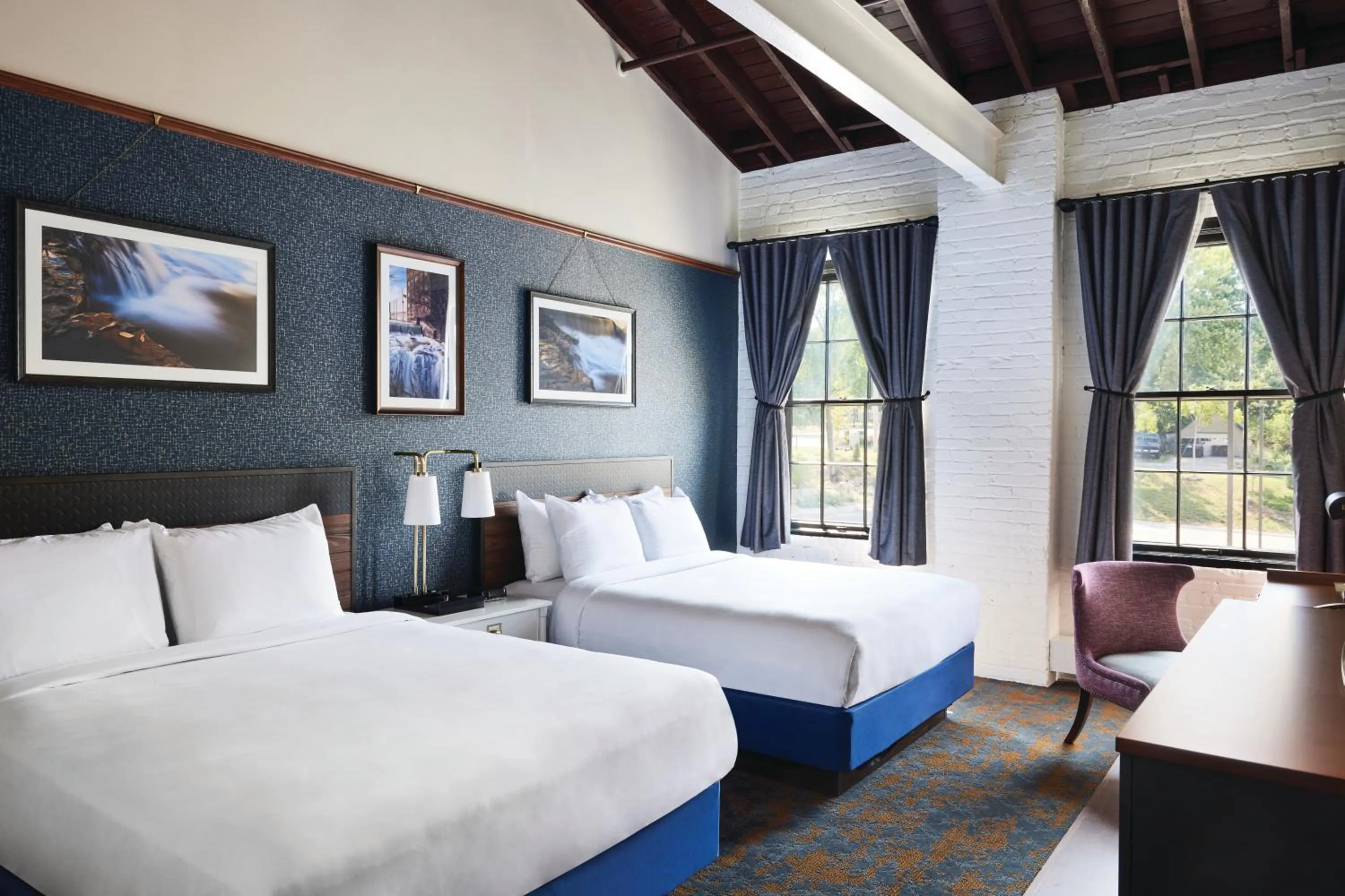 Bed in The Confluence Hotel