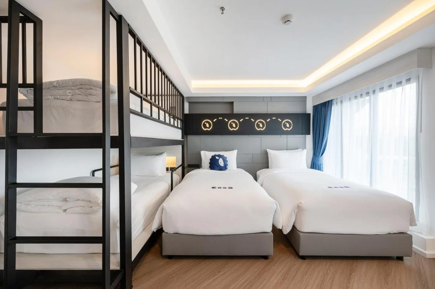 Bed in Kokotel Chiang Rai Airport Suites