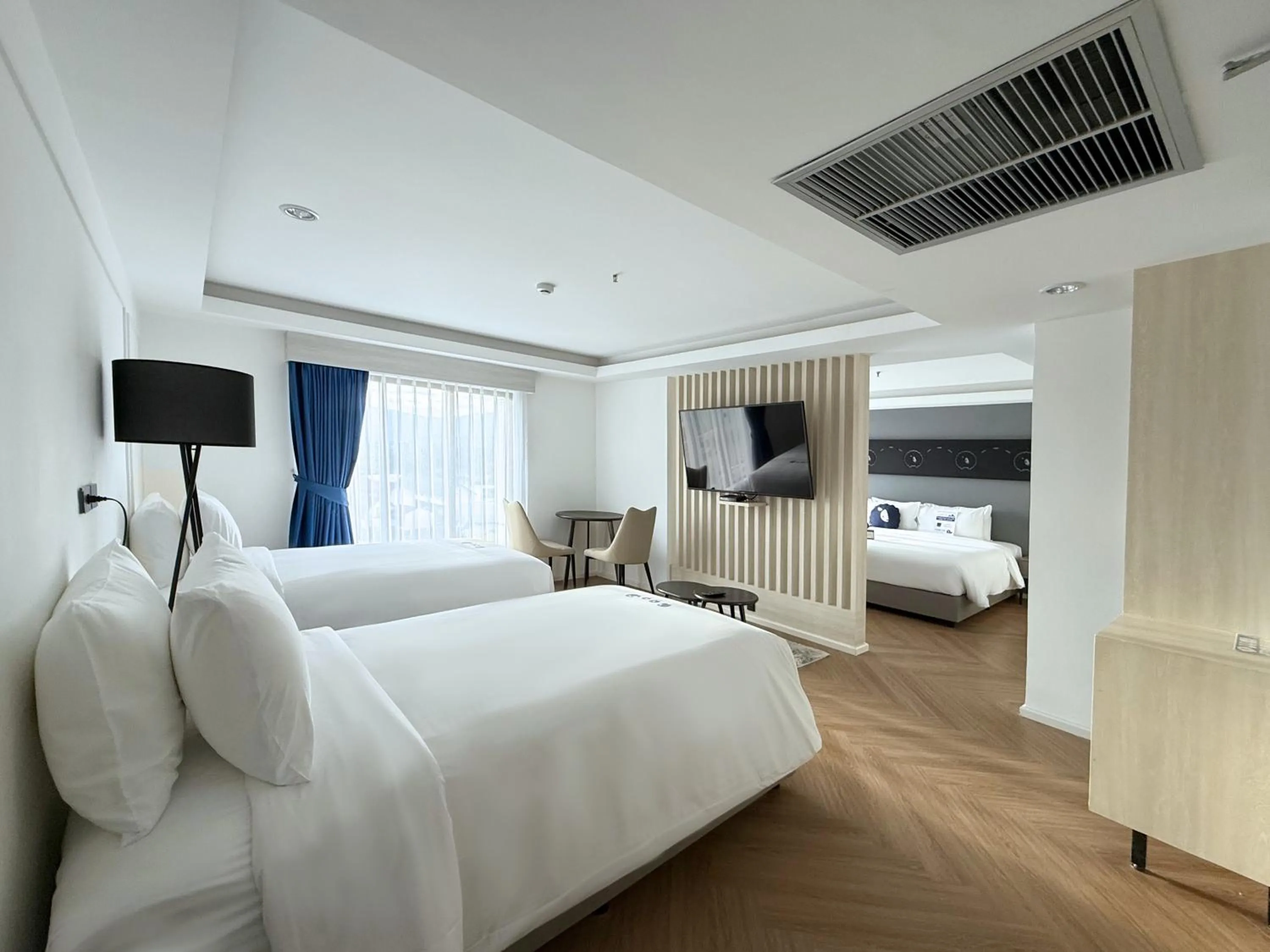 Bed in Kokotel Chiang Rai Airport Suites