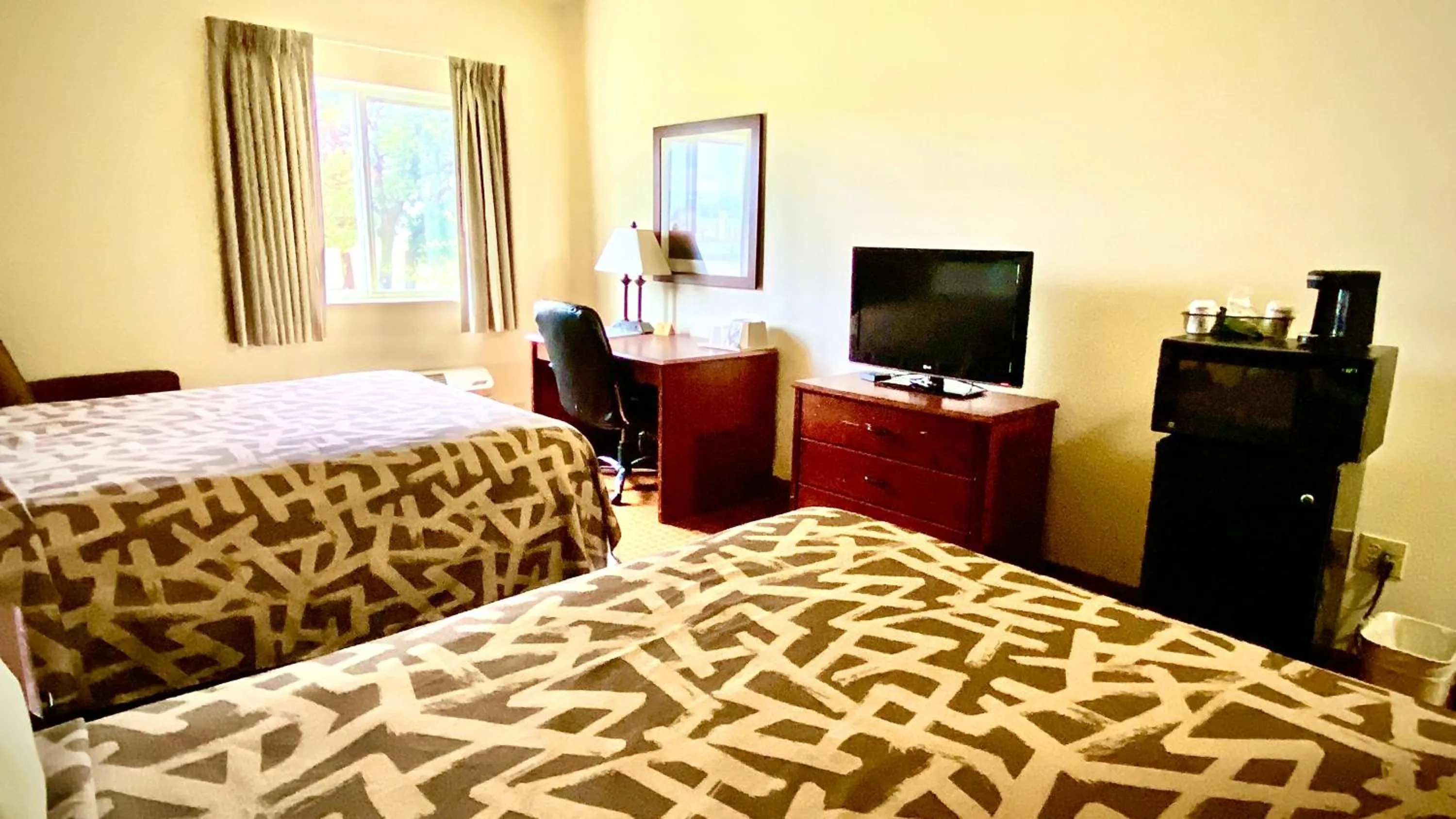 Bed in Park View Inn & Suites, Hoisington